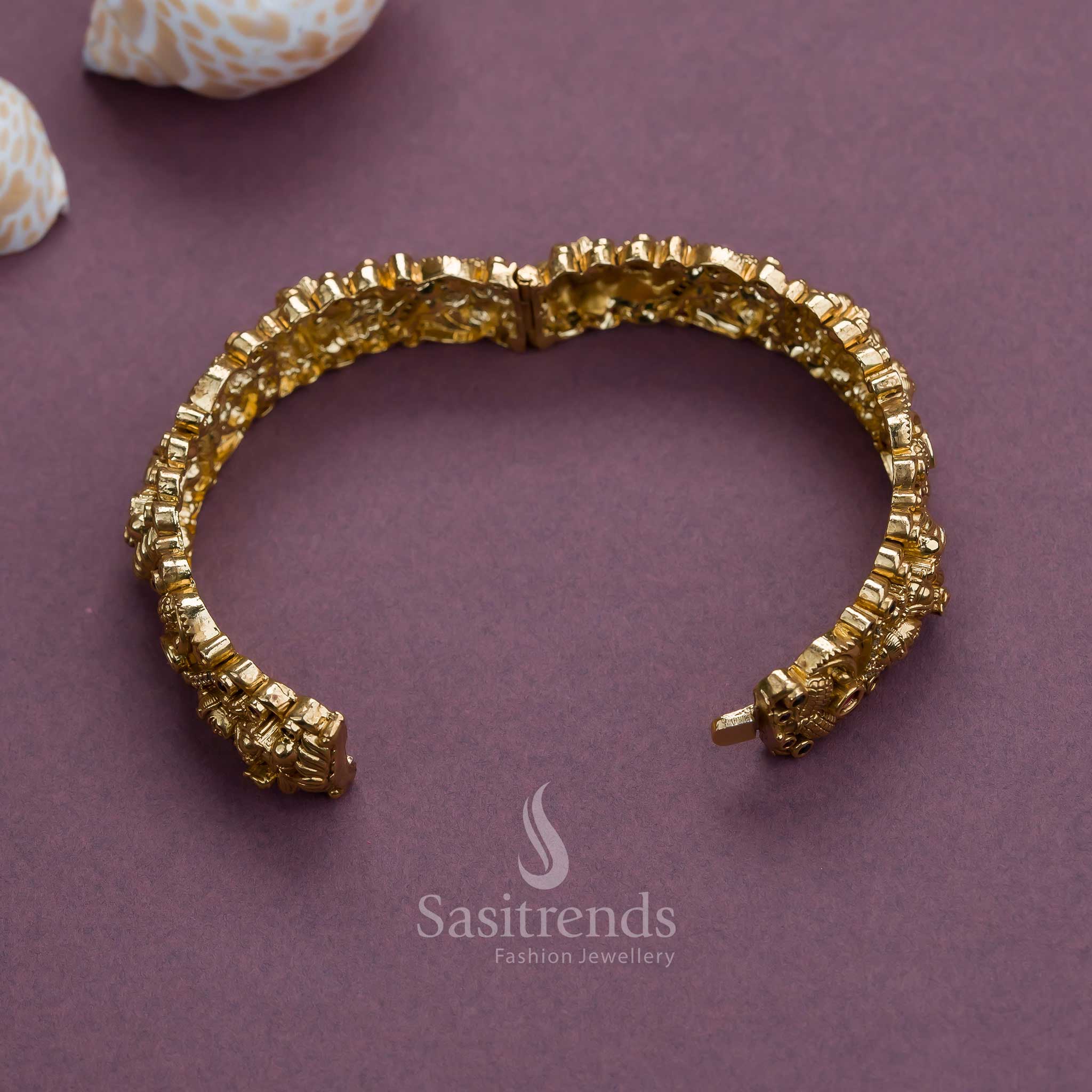 Majestic matte gold finish kada bangle with ruby-green stones and divine Goddess Lakshmi motif in a temple-style openable design, perfect for sarees and festive occasions – Sasitrends