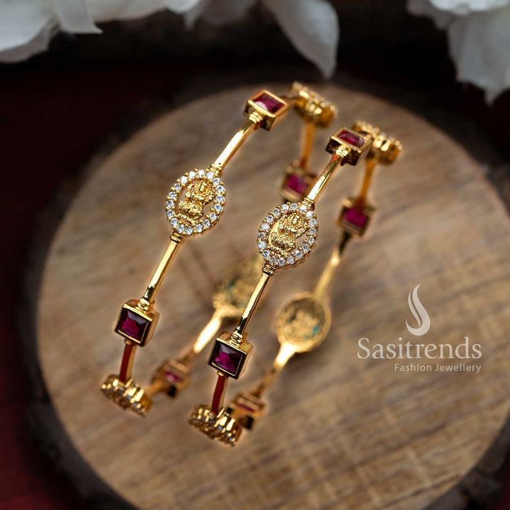 Exquisite traditional Lakshmi bangles pair in micro gold plating with white and ruby American diamond stones, presenting a regal festive jewellery design full of divine charm – Sasitrends