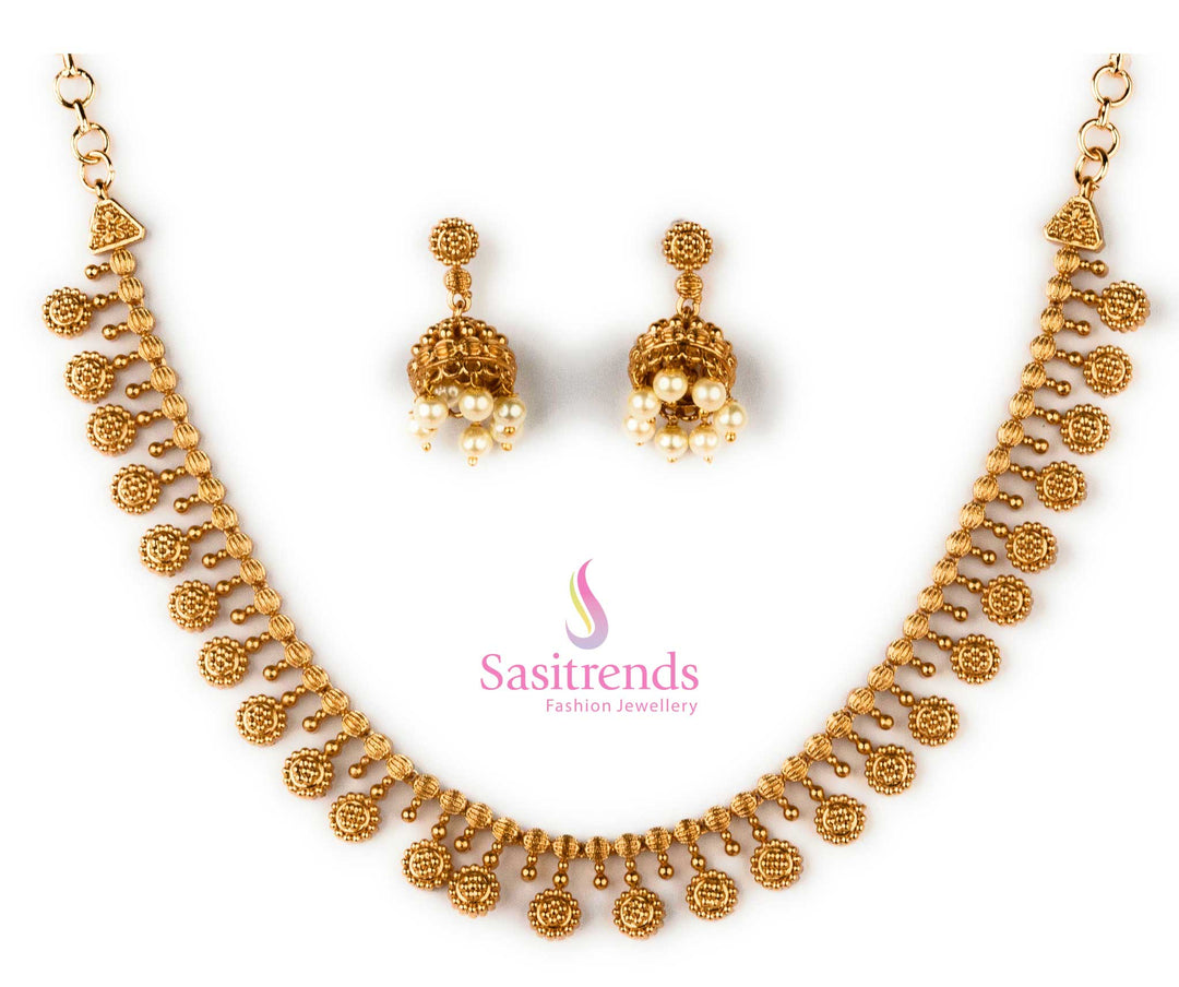 New traditional temple matte gold plated jewellery set featuring finely crafted jhumkas – a timeless adornment for women, echoing cultural elegance and perfect for South Indian bridal wear and festive occasions – Sasitrends