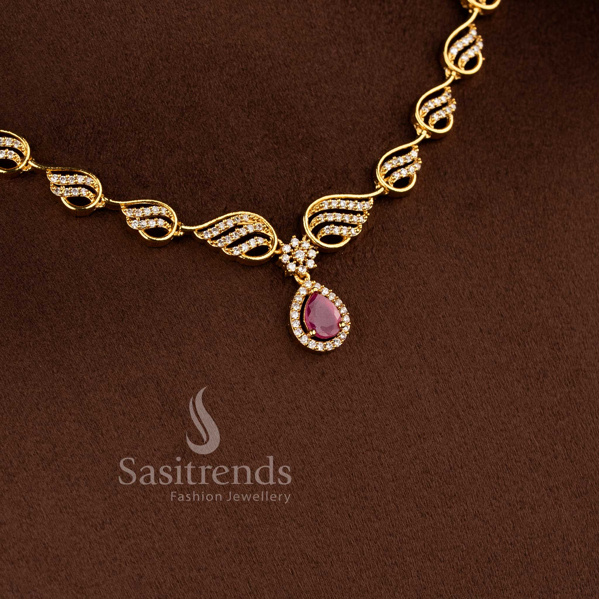 Stylish party wear AD stone necklace set with matte gold plating and delicate leaf-inspired pendant craftsmanship - Sasitrends.
