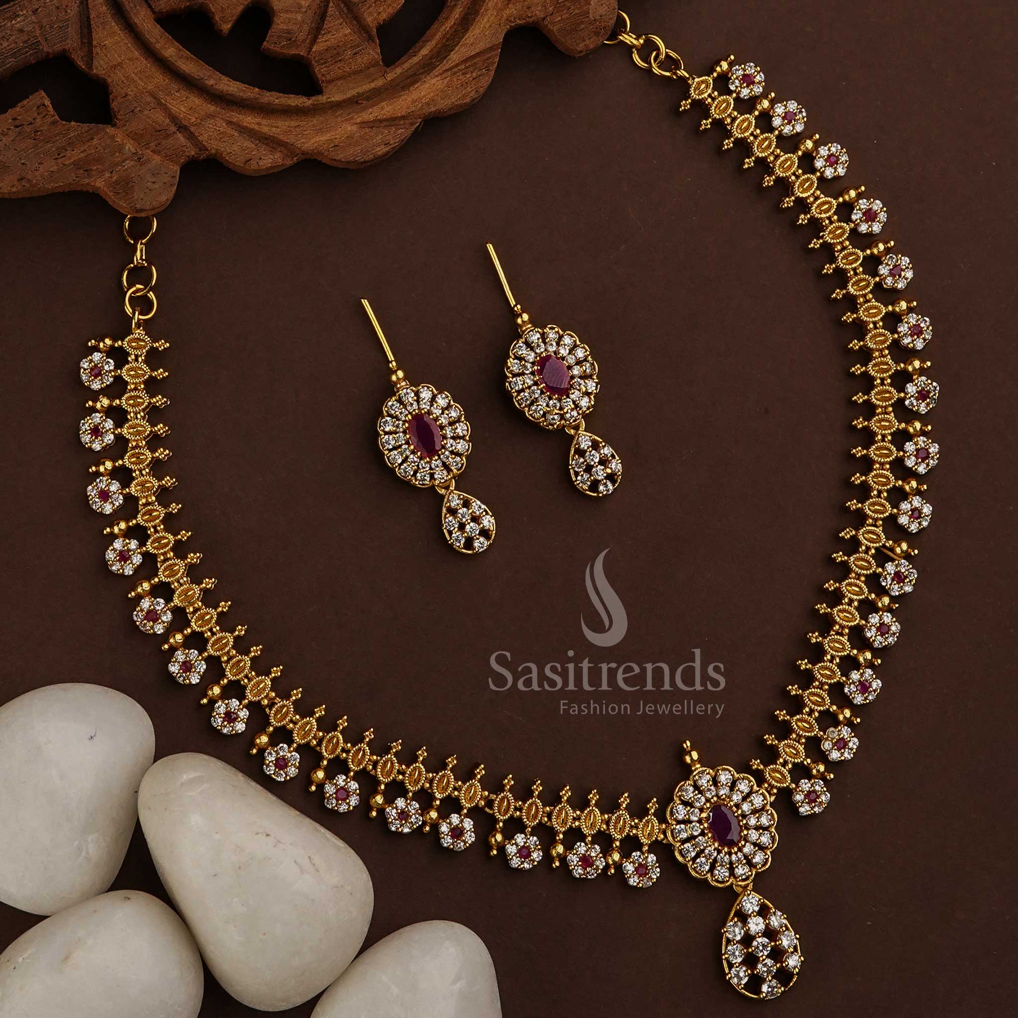 Charming white-ruby matte gold finish necklace jewellery set designed with American Diamond stones, perfect to style for both party and festive looks - Sasitrends