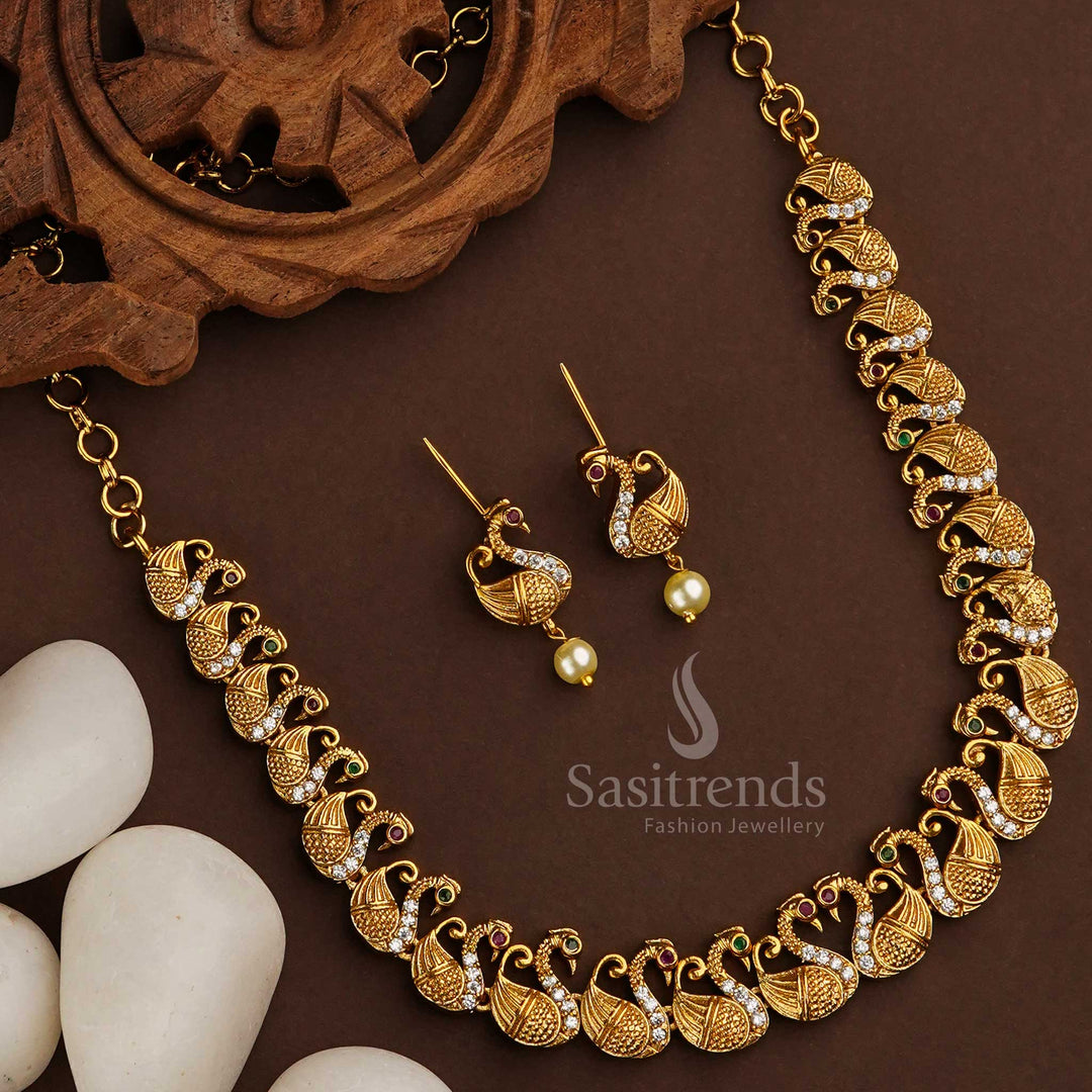 Gracefully crafted swan motif jewellery set with dazzling American Diamond stones in a rich matte gold tone – perfect for elegant traditional wear – Sasitrends