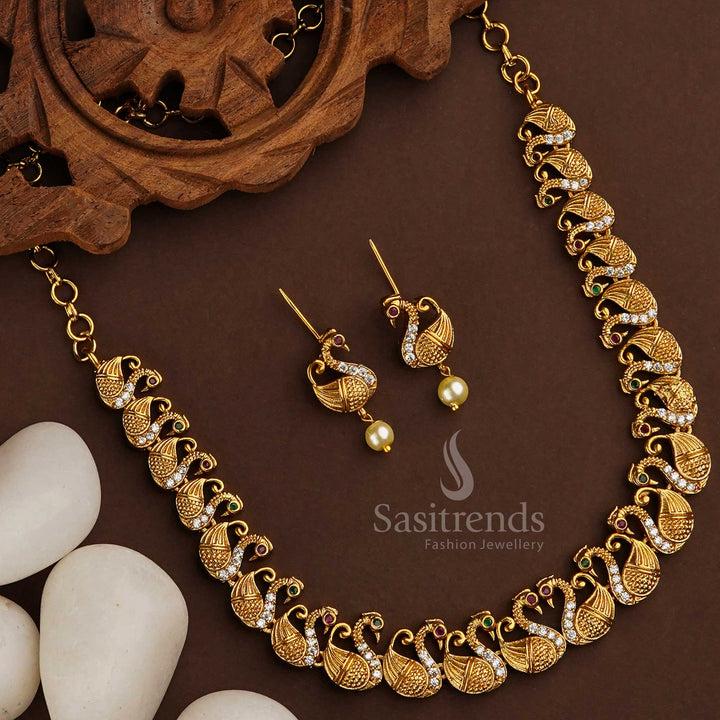 Gracefully crafted swan motif jewellery set with dazzling American Diamond stones in a rich matte gold tone – perfect for elegant traditional wear – Sasitrends