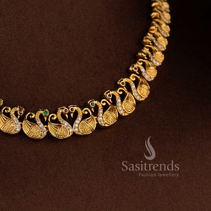 Gorgeous matte gold tone swan necklace jewellery set with American diamond stones by Sasitrends.