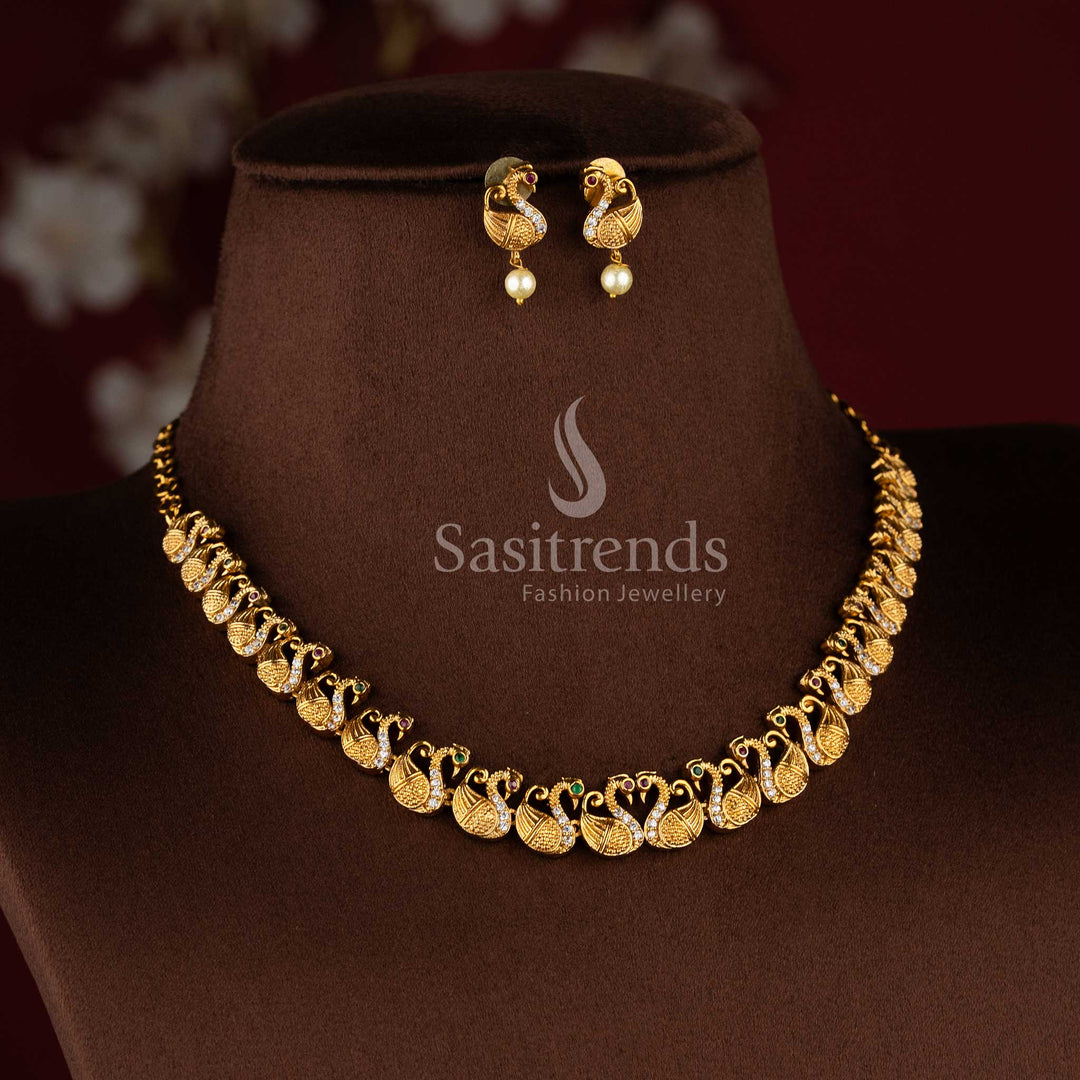 Gorgeous matte gold tone swan necklace jewellery set with American diamond stones by Sasitrends.