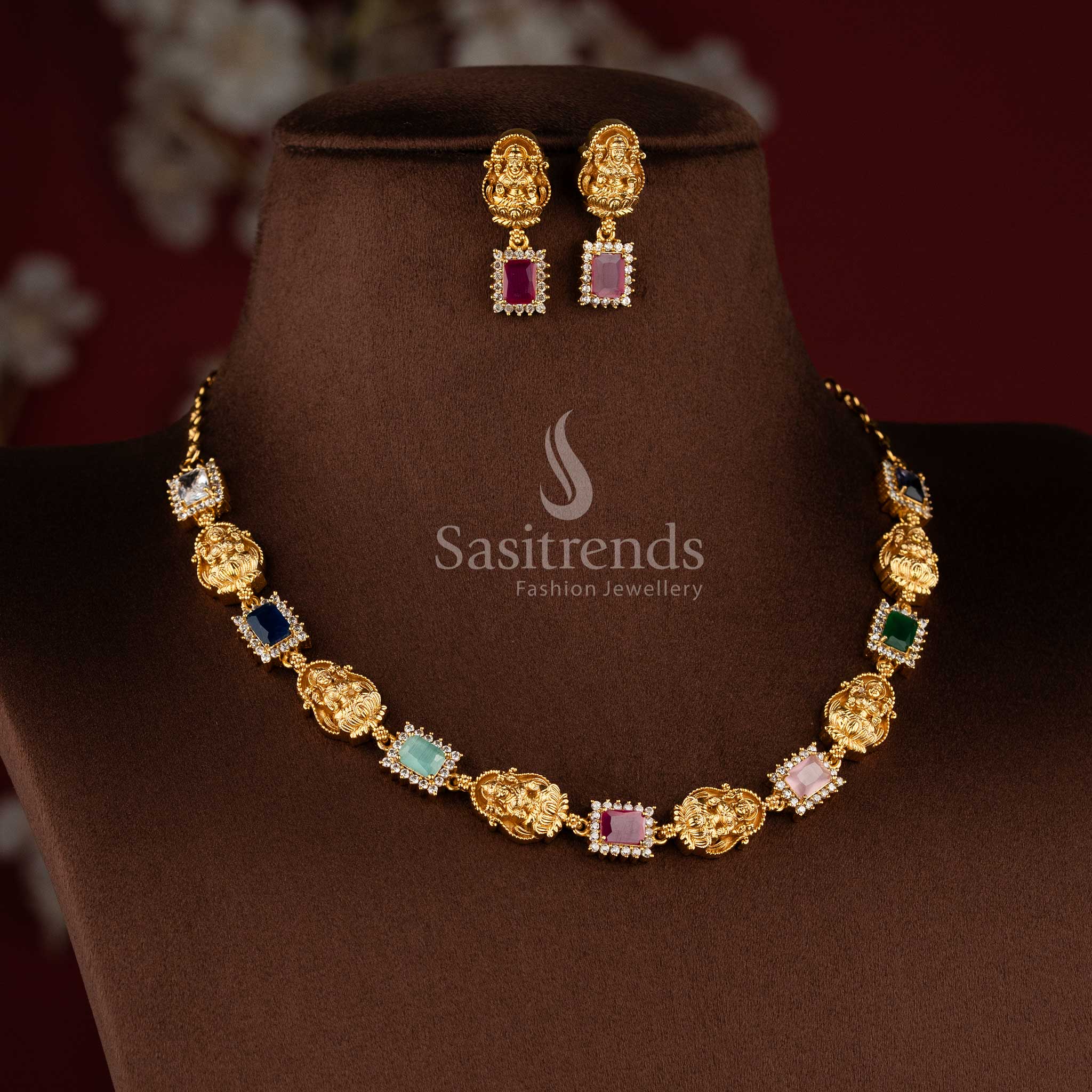 Matte gold temple necklace with Lakshmi motifs and multi-colored gemstones - Sasitrends