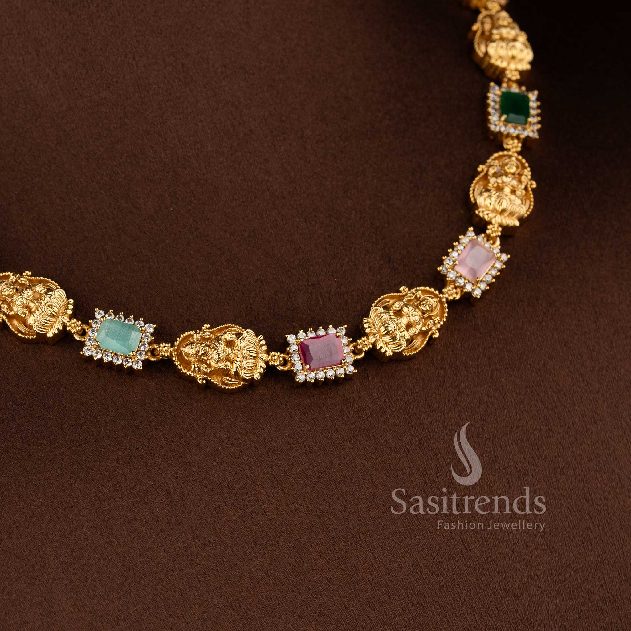 Matte gold temple necklace with Lakshmi motifs and multi-colored gemstones - Sasitrends