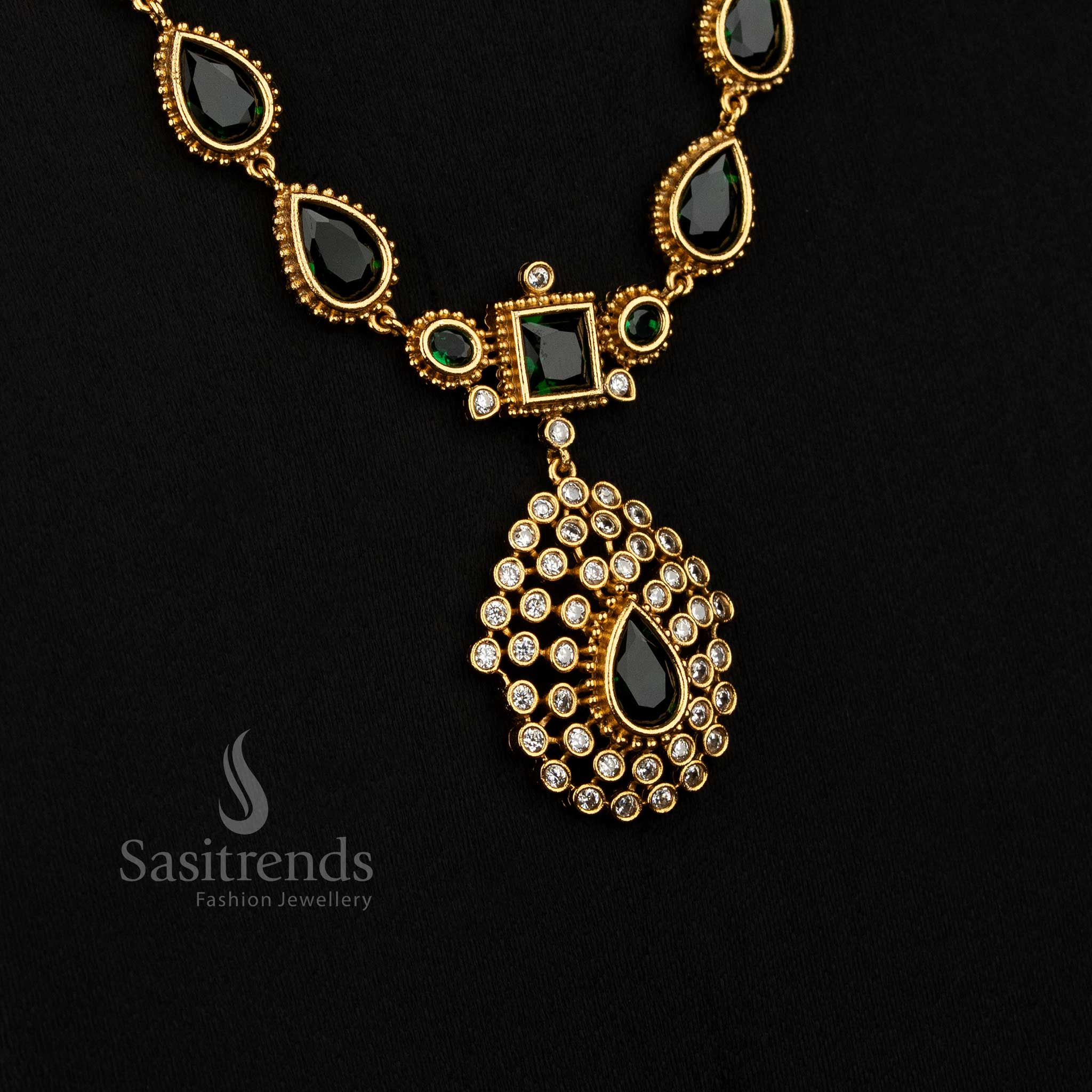 Vibrant green American Diamond teardrop stone matte gold plated long necklace for festive occasions - Sasitrends