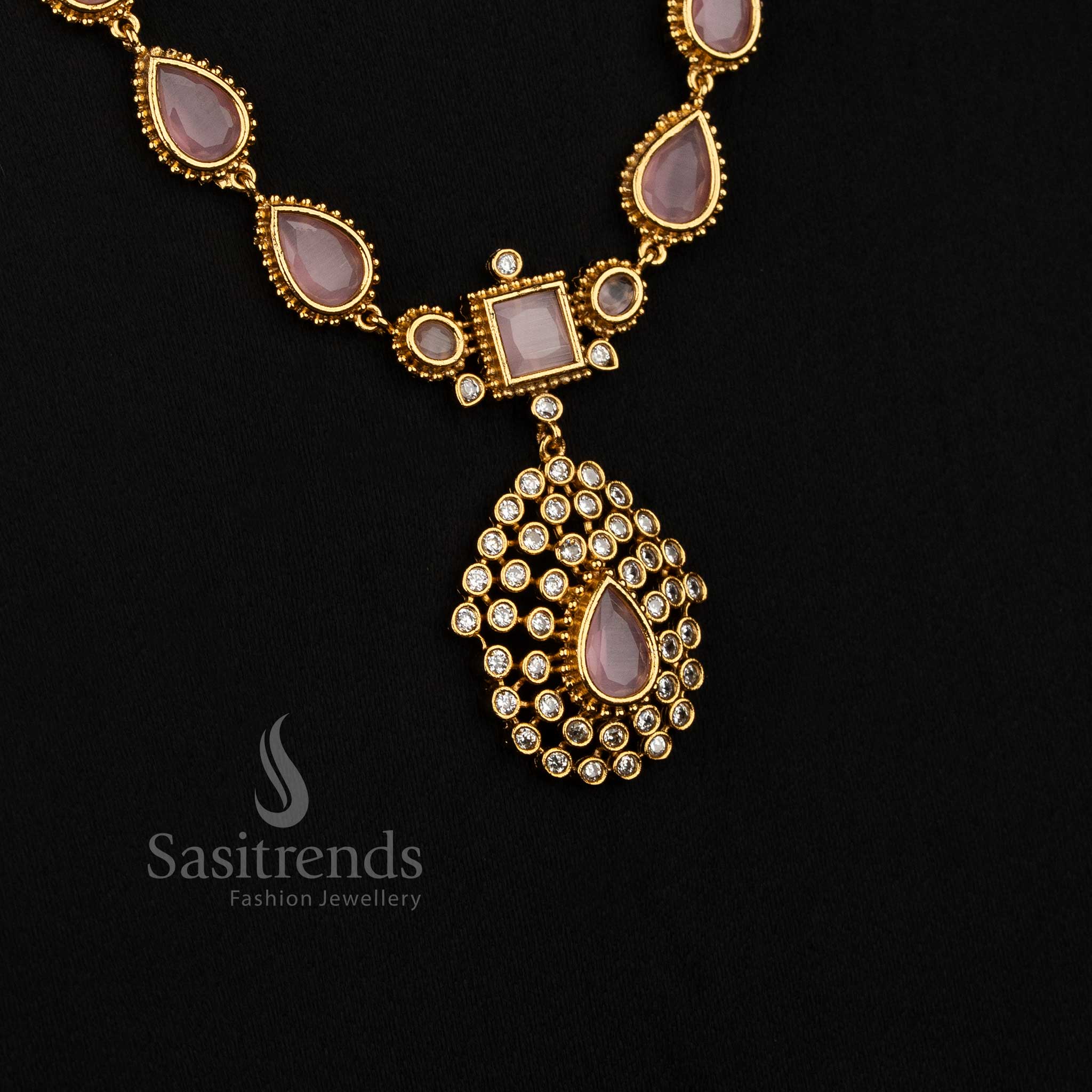 Delicate pink American Diamond matte gold plated teardrop stone long necklace for festive styling - Sasitrends