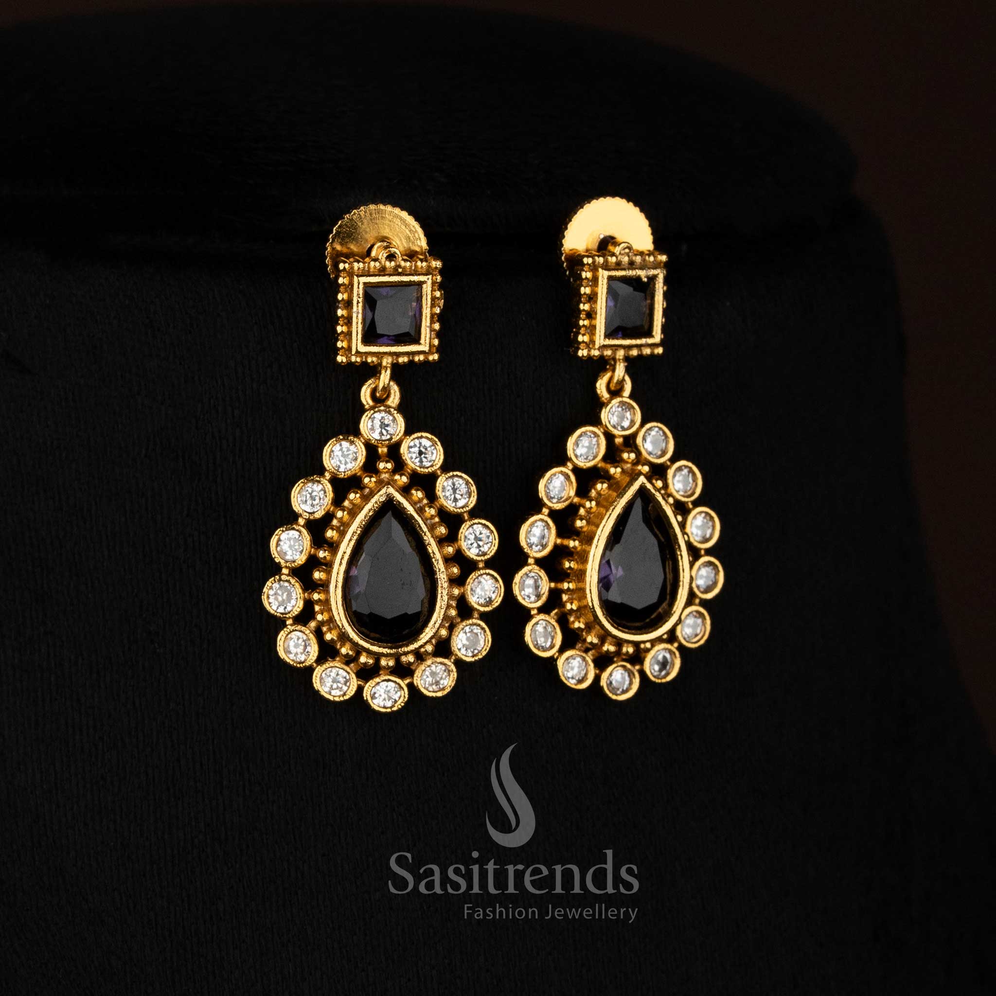 Stylish purple American Diamond matte gold plated teardrop stone earrings perfect for festive occasions - Sasitrends