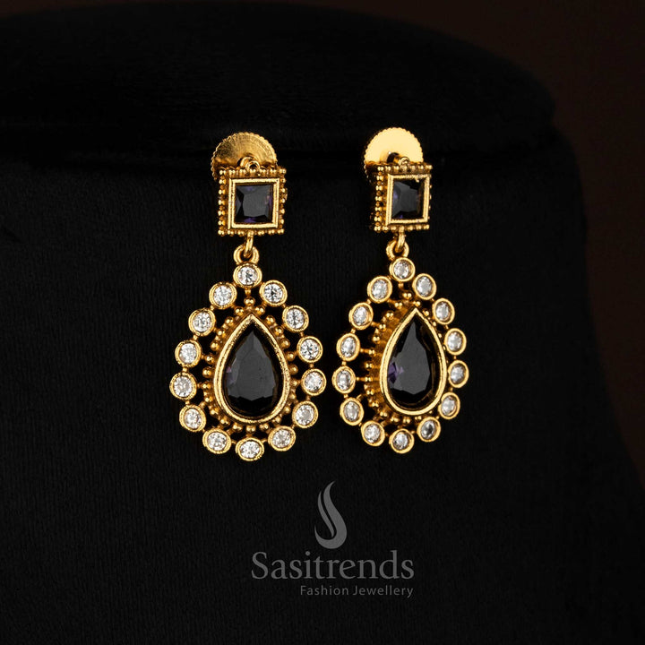 Stylish purple American Diamond matte gold plated teardrop stone earrings perfect for festive occasions - Sasitrends