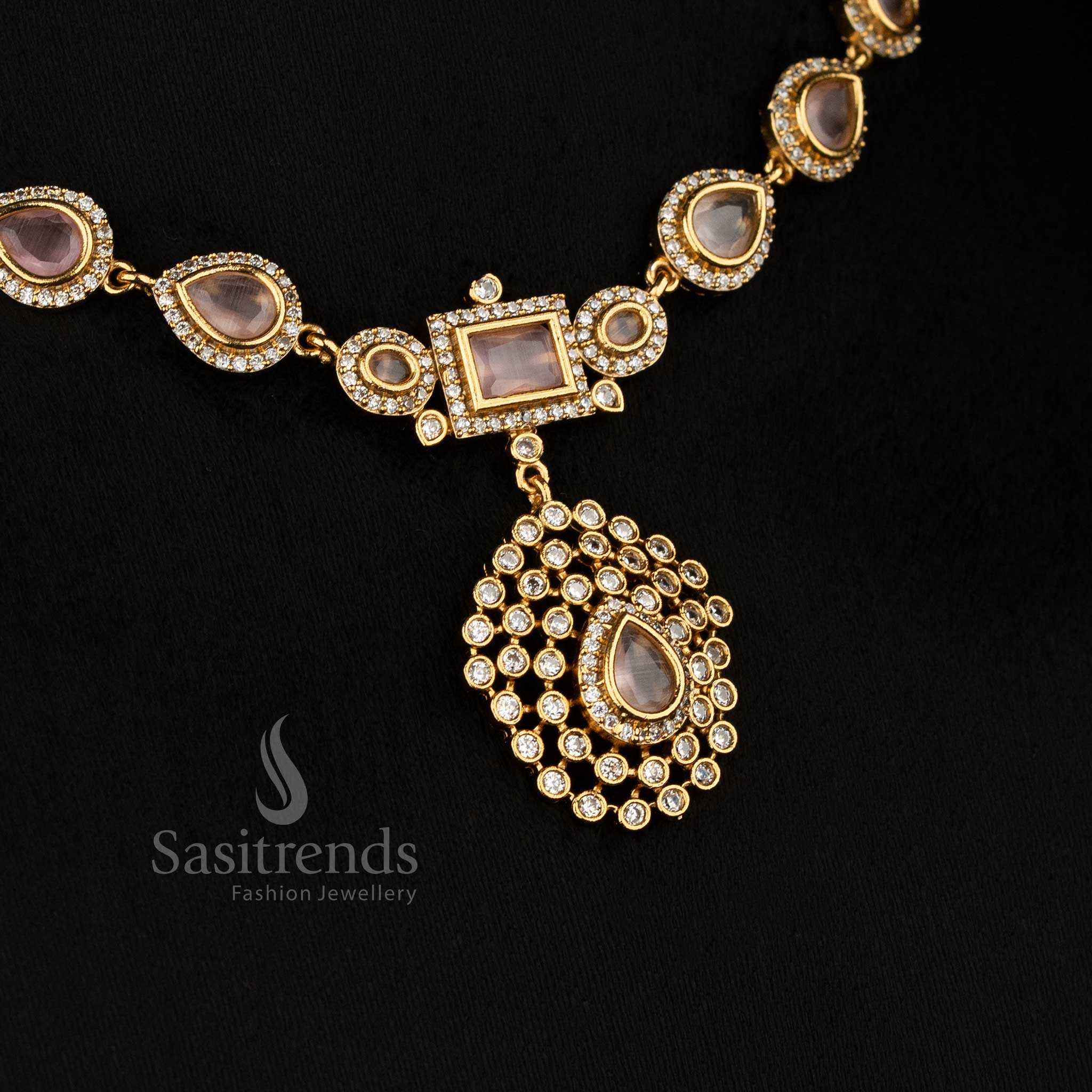 Charming pink American Diamond teardrop rectangle motif matte gold plated necklace ideal for fashionable events - Sasitrends