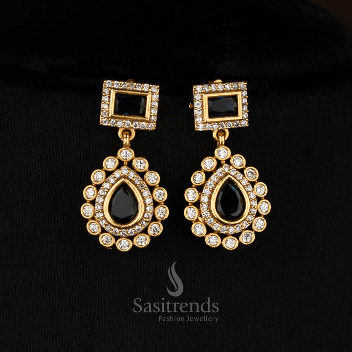 Sleek black American Diamond teardrop rectangle motif matte gold plated earrings for modern functions - Sasitrends