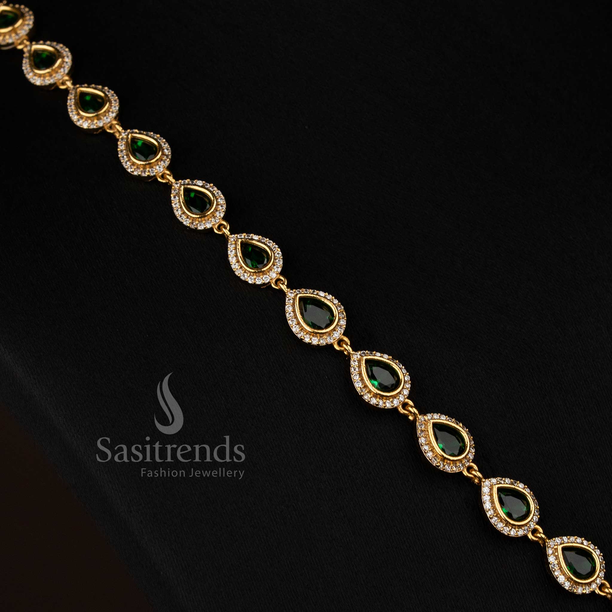 Statement green American Diamond matte gold plated teardrop rectangle motif necklace for evening functions - Sasitrends