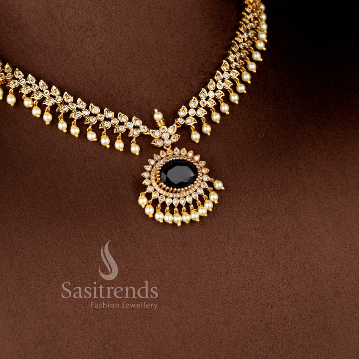 Close-up view of Matte Gold Plated American Diamond Oval Linked Necklace Set featuring cascading paisley motifs, pearl drops stones - Sasitrends