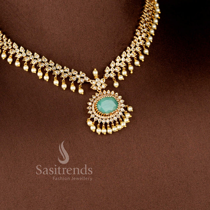 Luxurious Matte Gold Plated American Diamond Oval Linked Necklace Set with Cascading Paisley Stones and Pearls in Mint Green Color for Wedding and Bridal Wear - Sasitrends