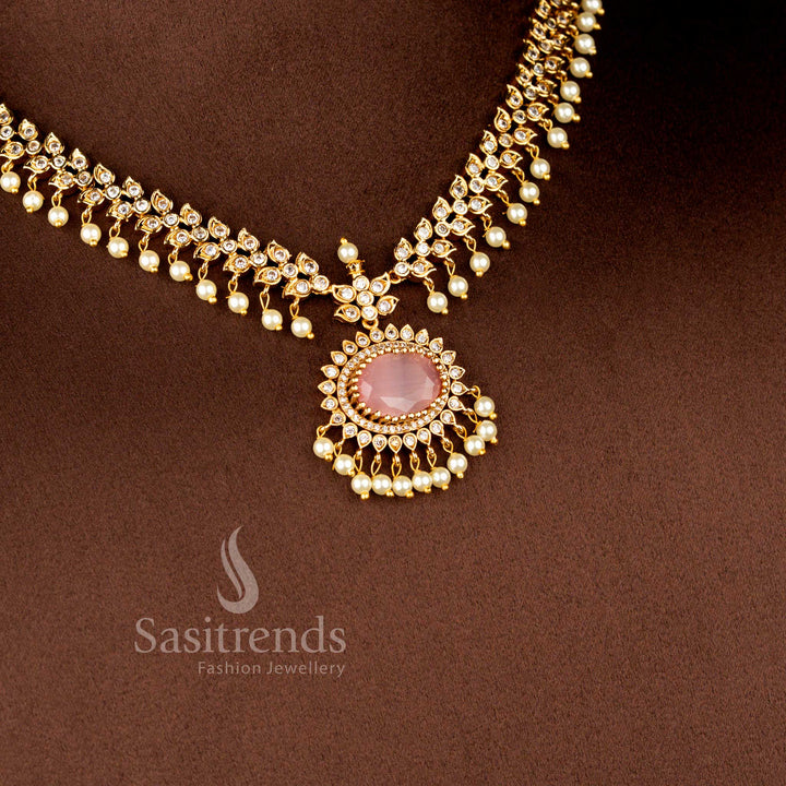 Close-up view of Matte Gold Plated American Diamond Oval Linked Necklace Set featuring cascading paisley motifs, pearl drops stones - Sasitrends