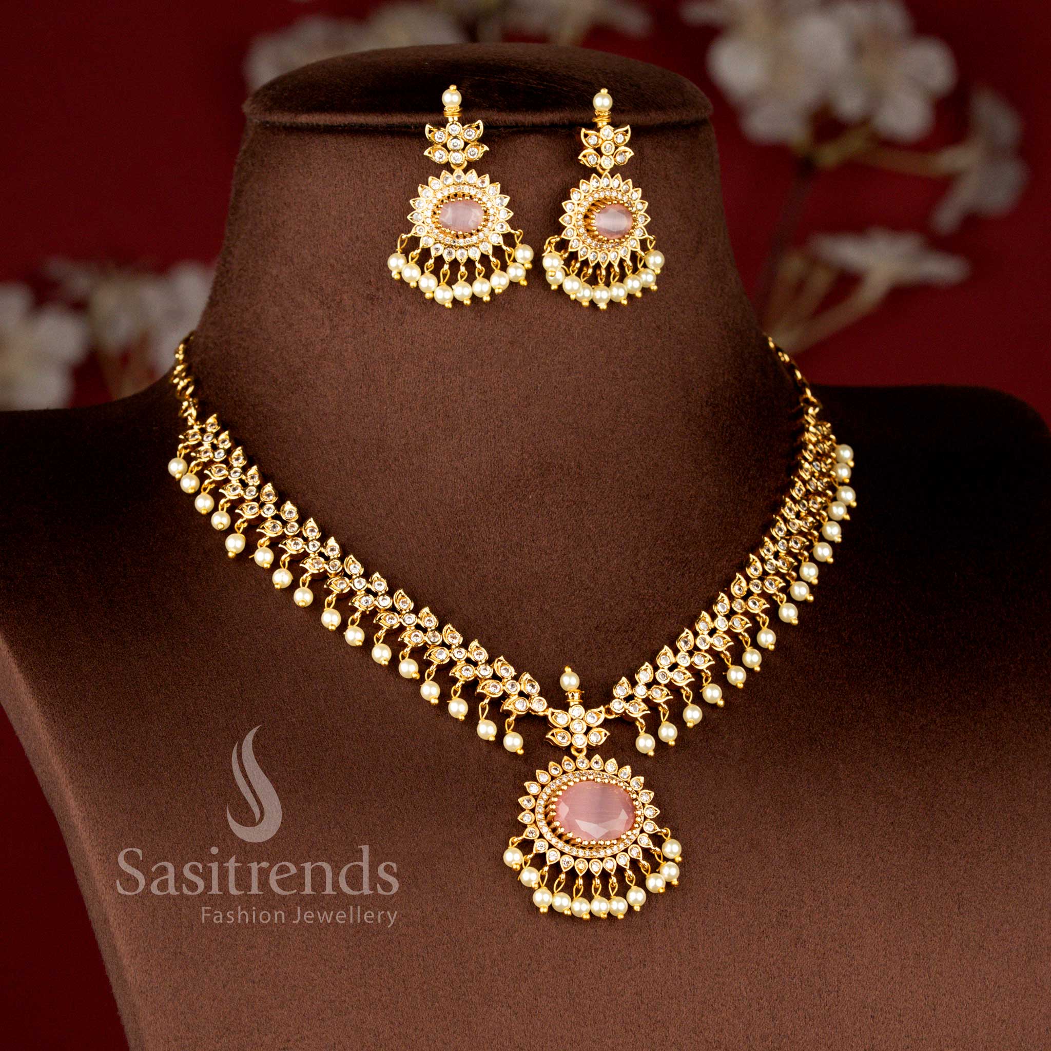 Luxurious Matte Gold Plated American Diamond Oval Linked Necklace Set with Cascading Paisley Stones and Pearls in Mint Green Color for Wedding and Bridal Wear - Sasitrends