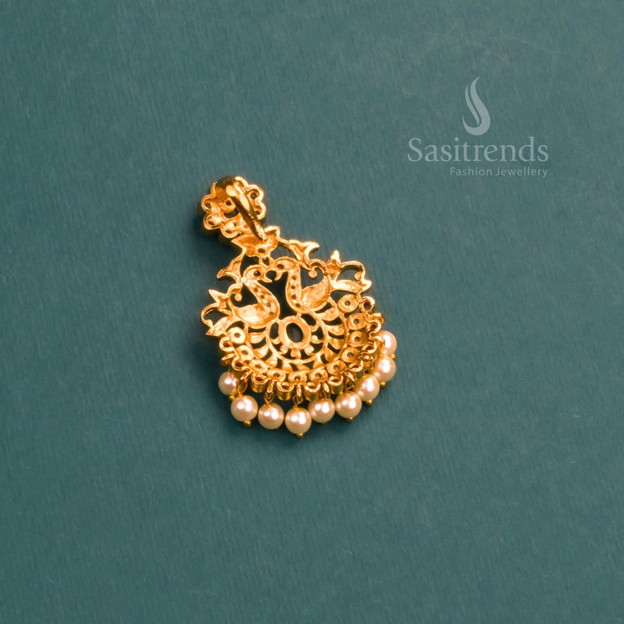 Graceful temple-style matte gold peacock featuring shimmering white-green AD stones, intricate pearl detailing, and beautifully coordinated earrings – jewellery elegance from Sasitrends