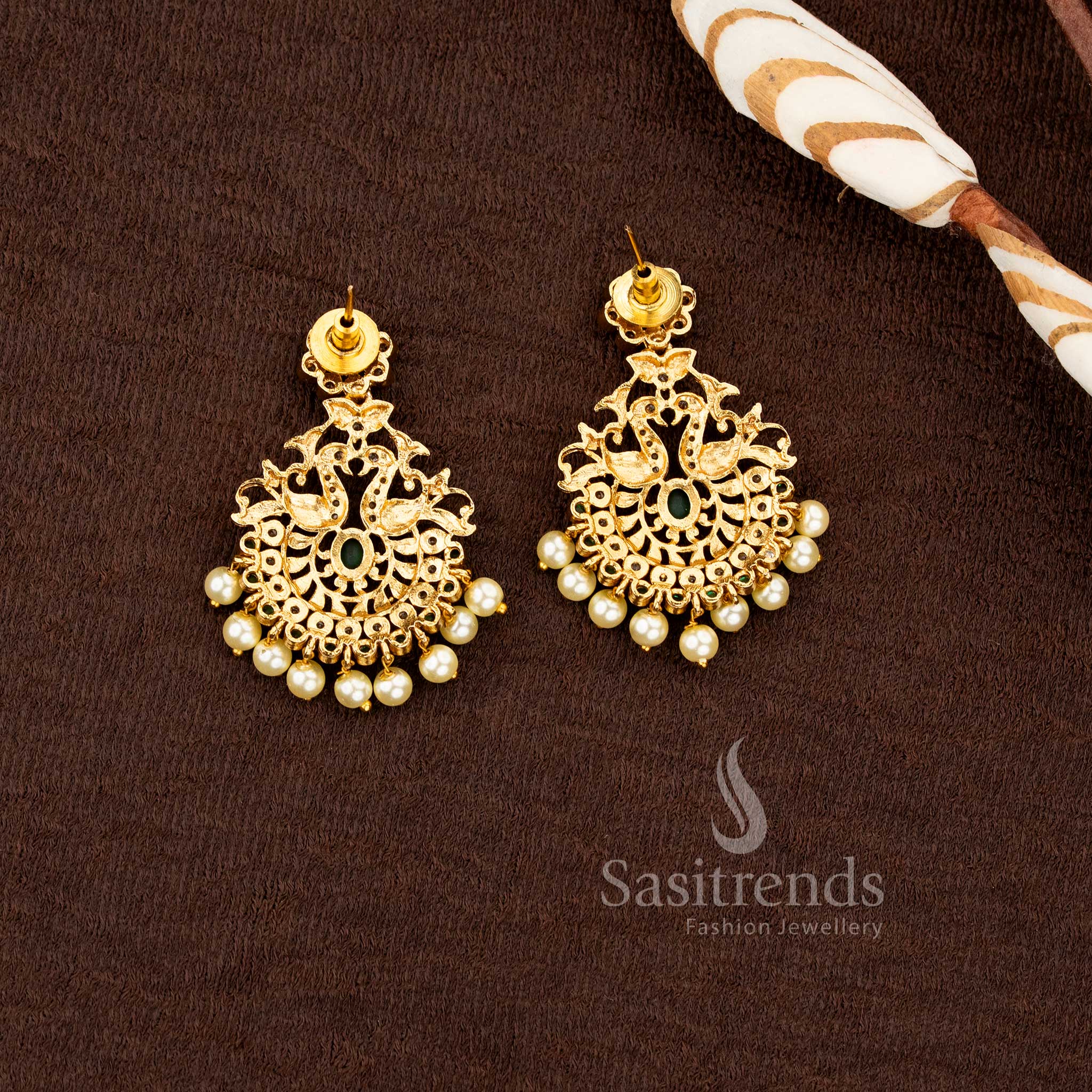 South Indian matte gold pendant set with multi color stones and pearl clusters by Sasitrends