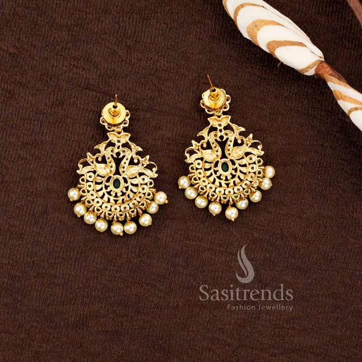 South Indian matte gold pendant set with multi color stones and pearl clusters by Sasitrends