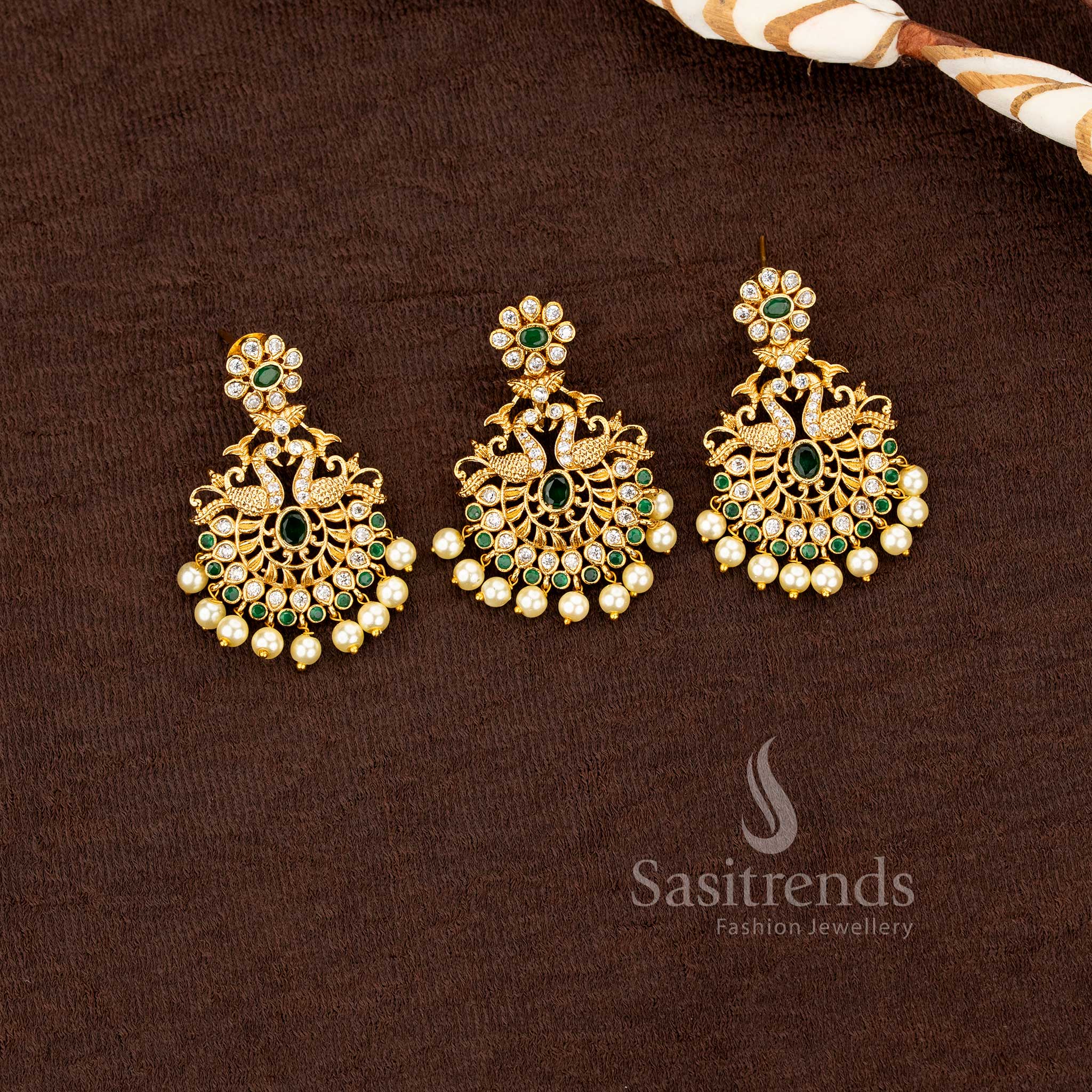 South Indian matte gold pendant set with multi color stones and pearl clusters by Sasitrends