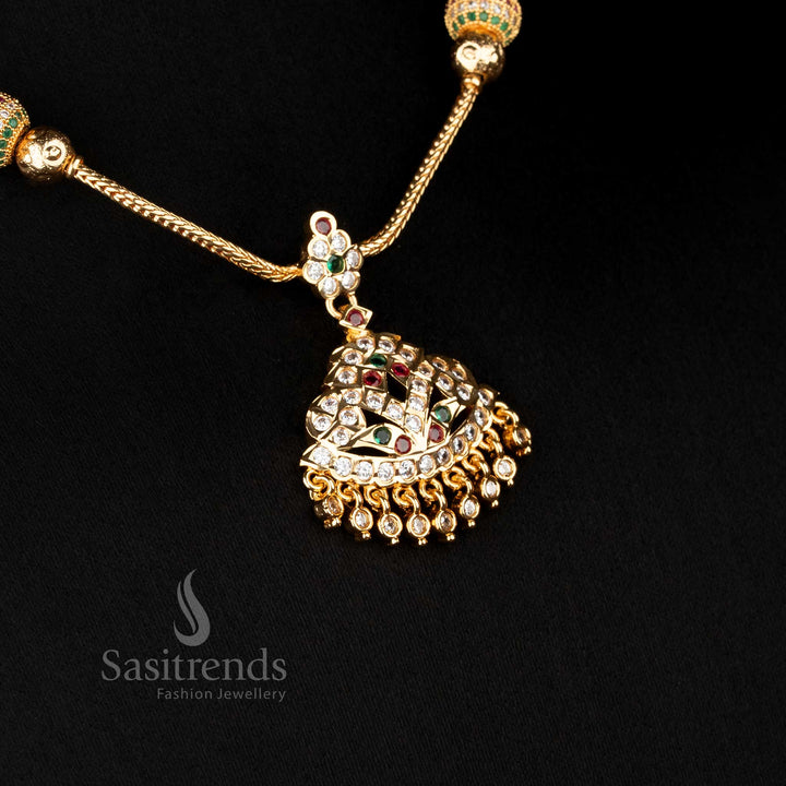 Temple style necklace featuring raised dome pendant and stone pattern structure