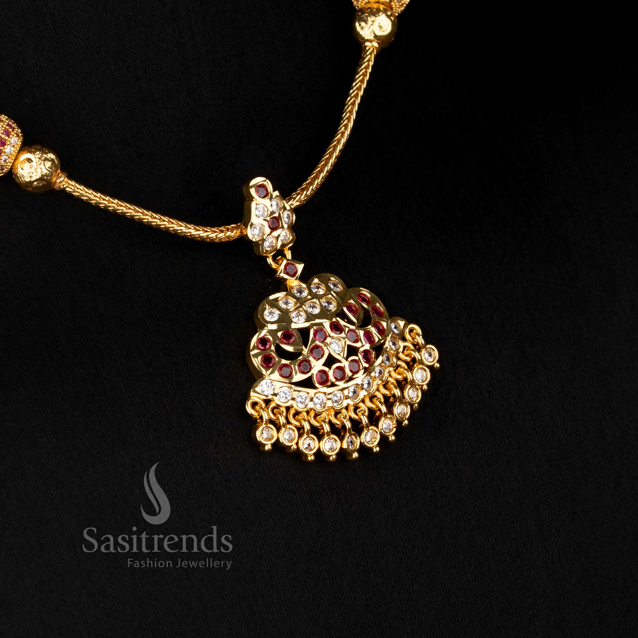 Impon addigai necklace with multi-layer dome pendant and green ruby stones