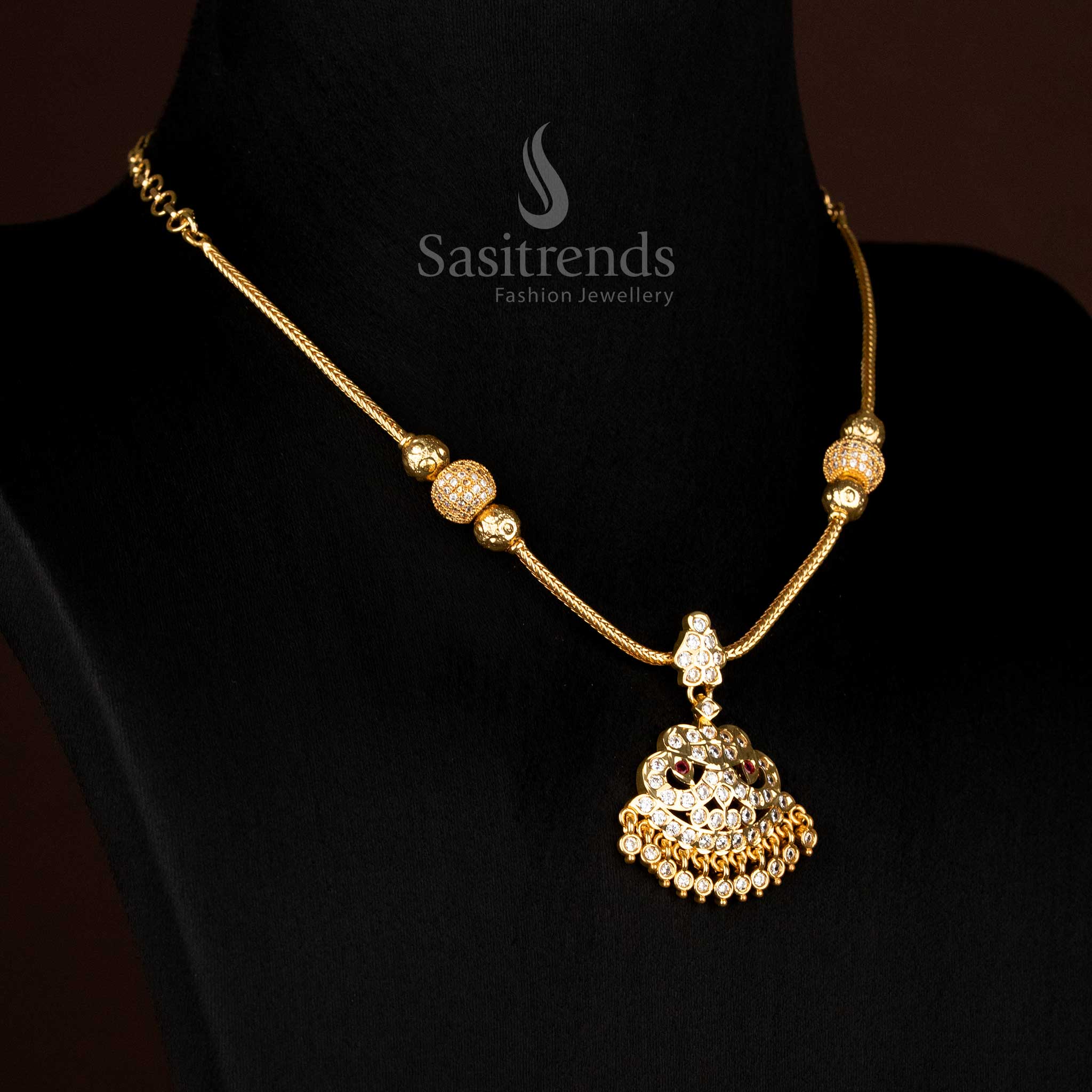 Impon addigai necklace with multi-layer dome pendant and green ruby stones