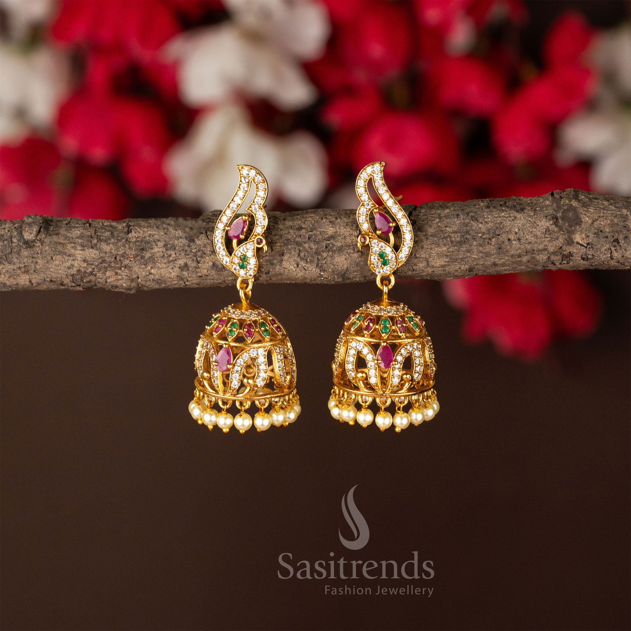 Vibrant multi-stone peacock jhumka earrings with temple matte gold plating, showcasing artistic detailing and traditional jewellery charm - Sasitrends