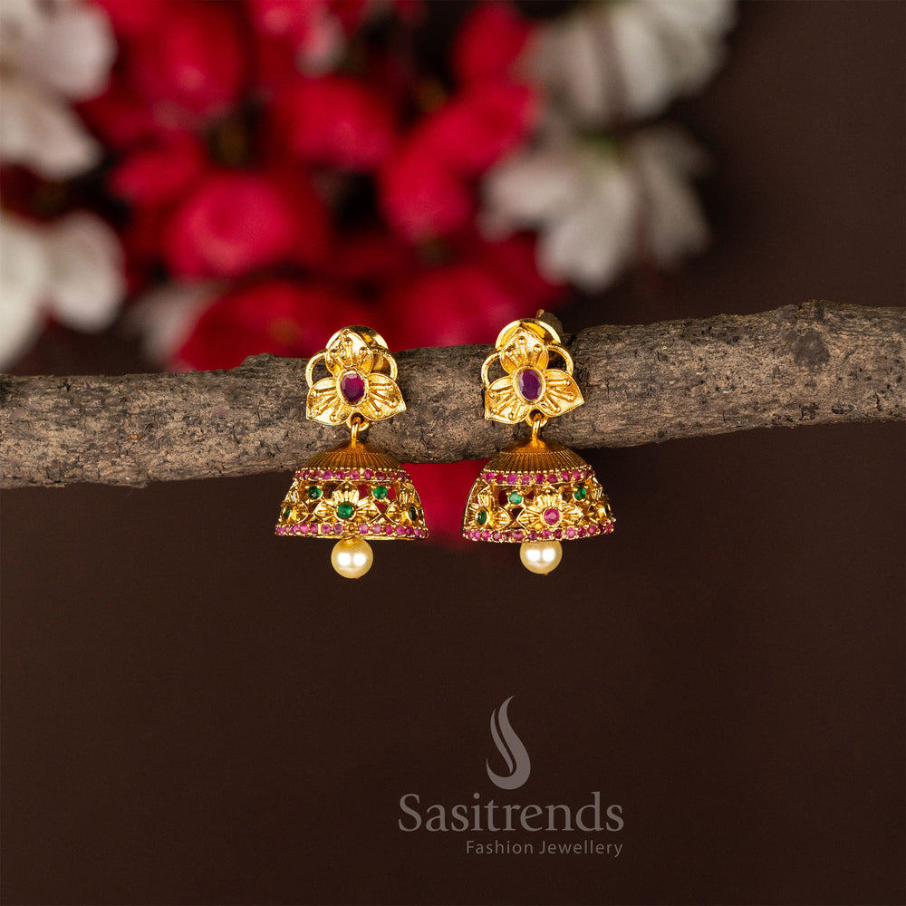Temple matte gold flower jhumka earrings accented with ruby-green stones and a regal traditional jewellery touch for ethnic elegance - Sasitrends