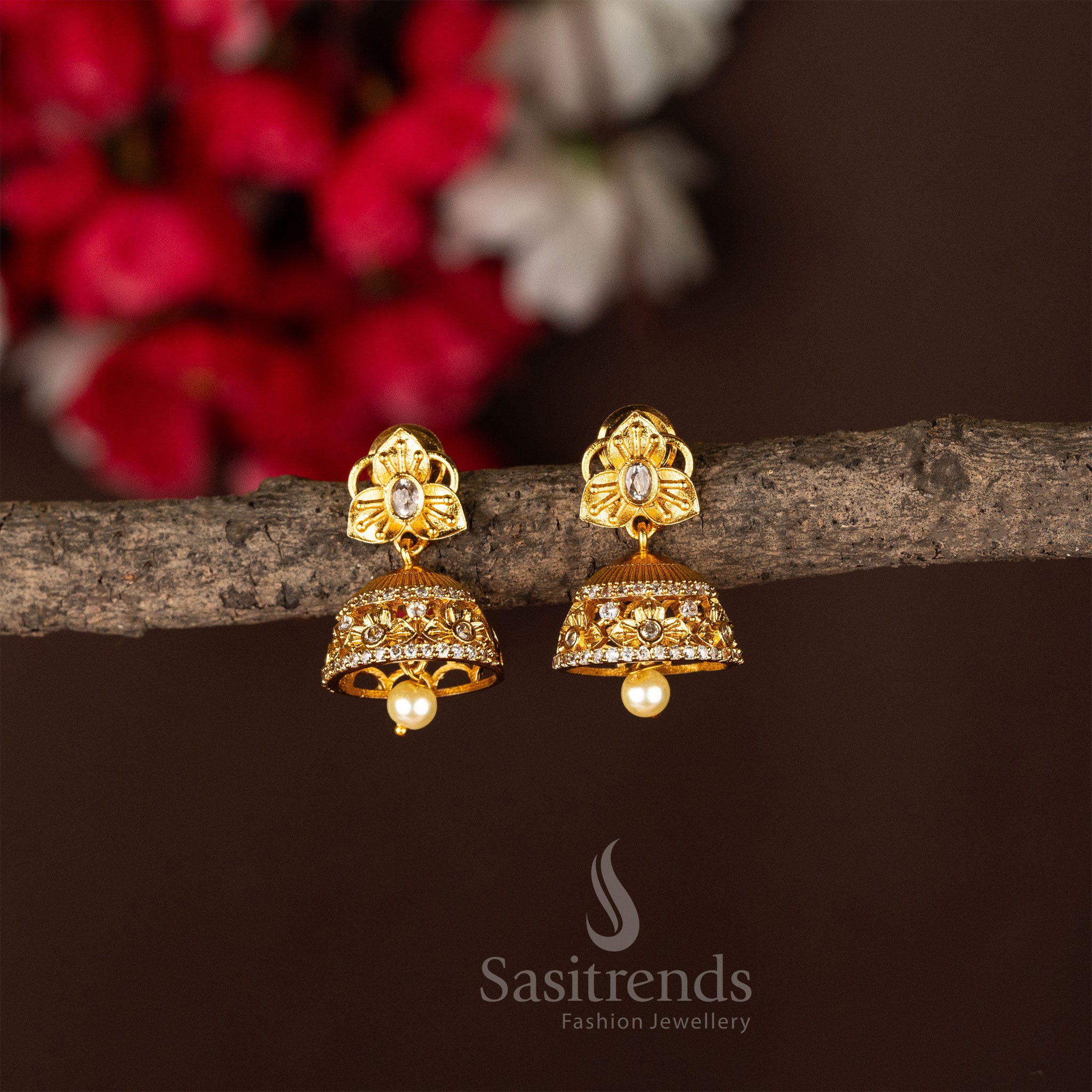 Temple matte gold plated flower jhumka earrings embellished with elegant white stones and intricate traditional jewellery design - Sasitrends