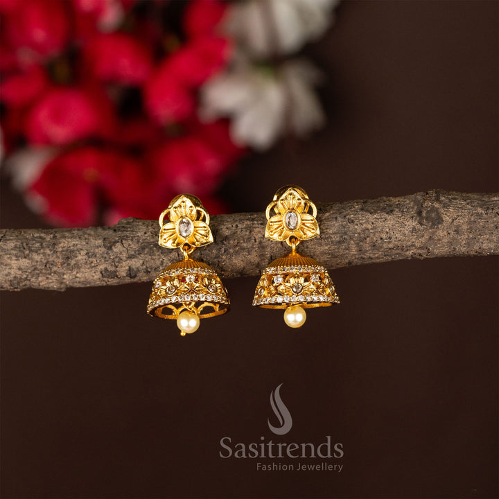 Temple matte gold plated flower jhumka earrings embellished with elegant white stones and intricate traditional jewellery design - Sasitrends