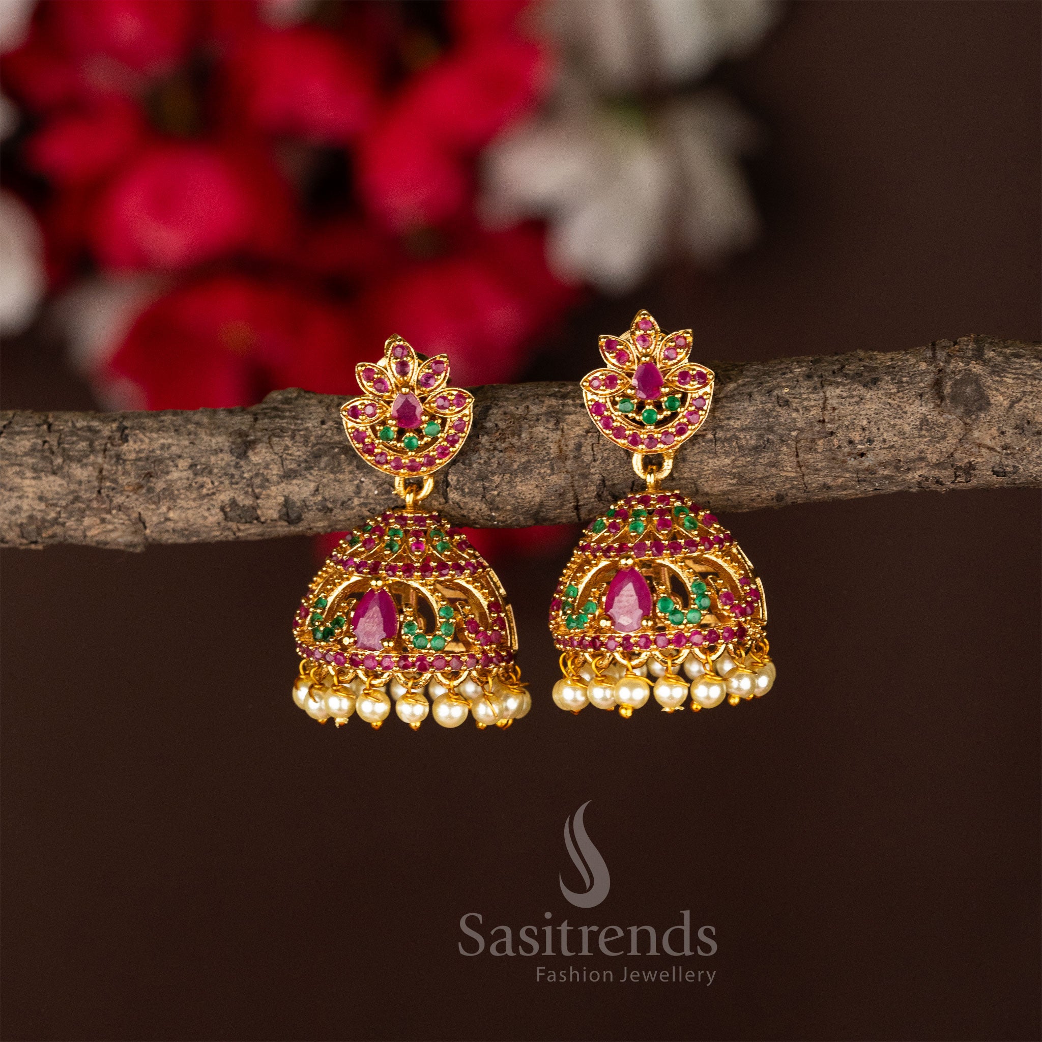 Temple gold plated lotus jhumka earrings in ruby-green stonework, reflecting elegant jewellery craftsmanship and classic temple styling - Sasitrends

