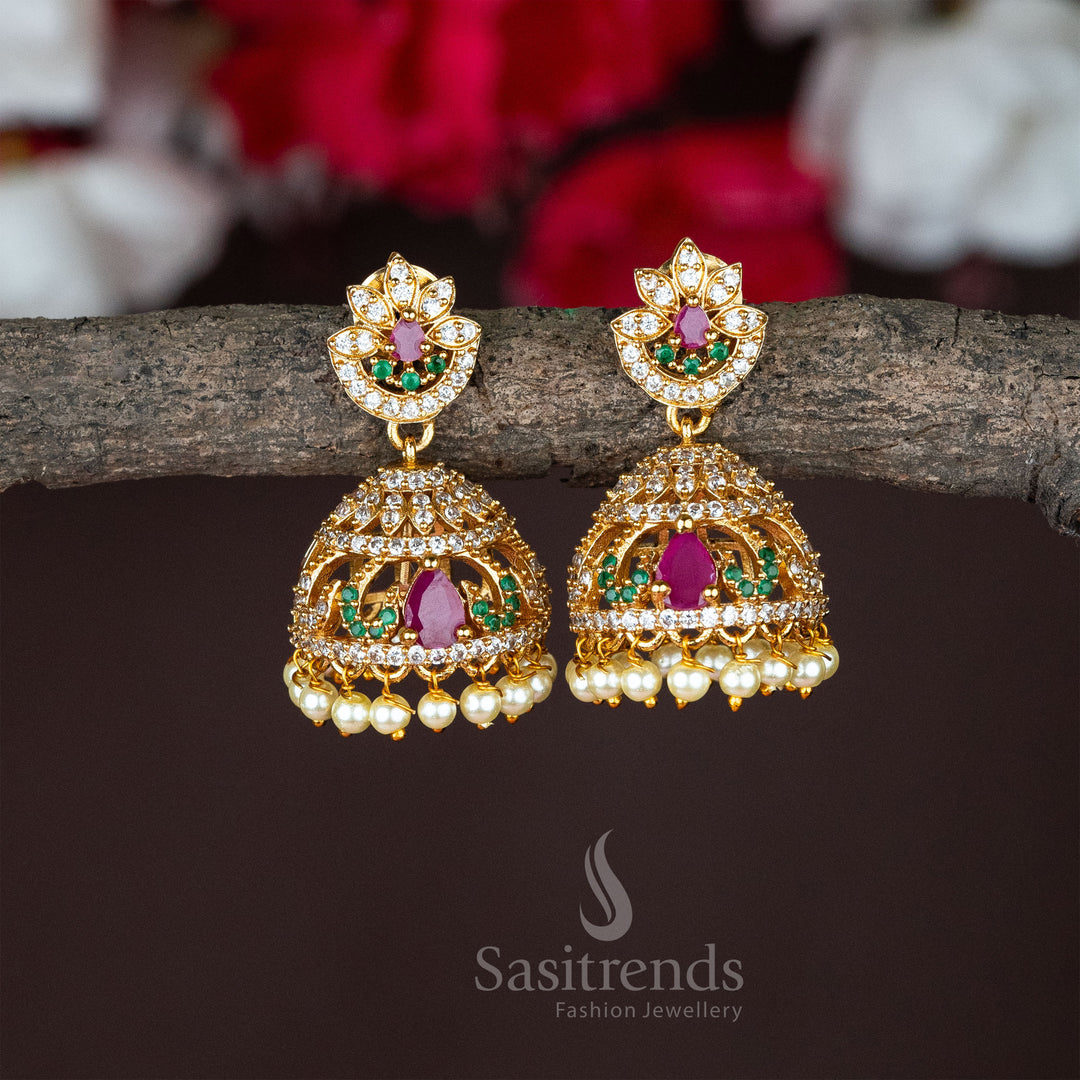 Colourful lotus flower jhumka earrings with matte gold touch, making a festive jewellery statement with bold traditional accents - Sasitrends