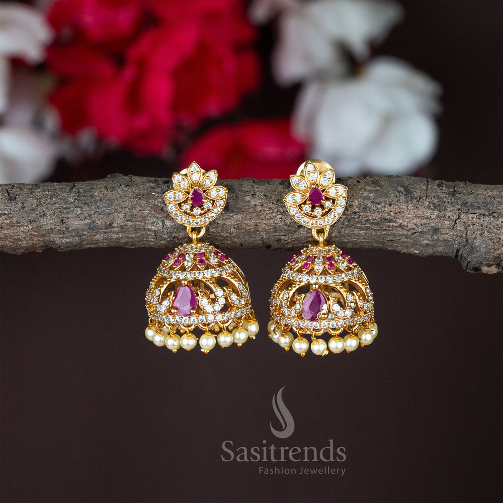 Temple matte gold lotus jhumka earrings with white-ruby stones, embodying cultural richness and refined jewellery elegance - Sasitrends