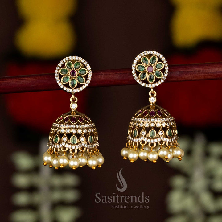 Premium Matte Gold Plated AD Stone Emerald Floral Halo Jhumka Earrings with Pearl Drops | Temple & Bridal Wear