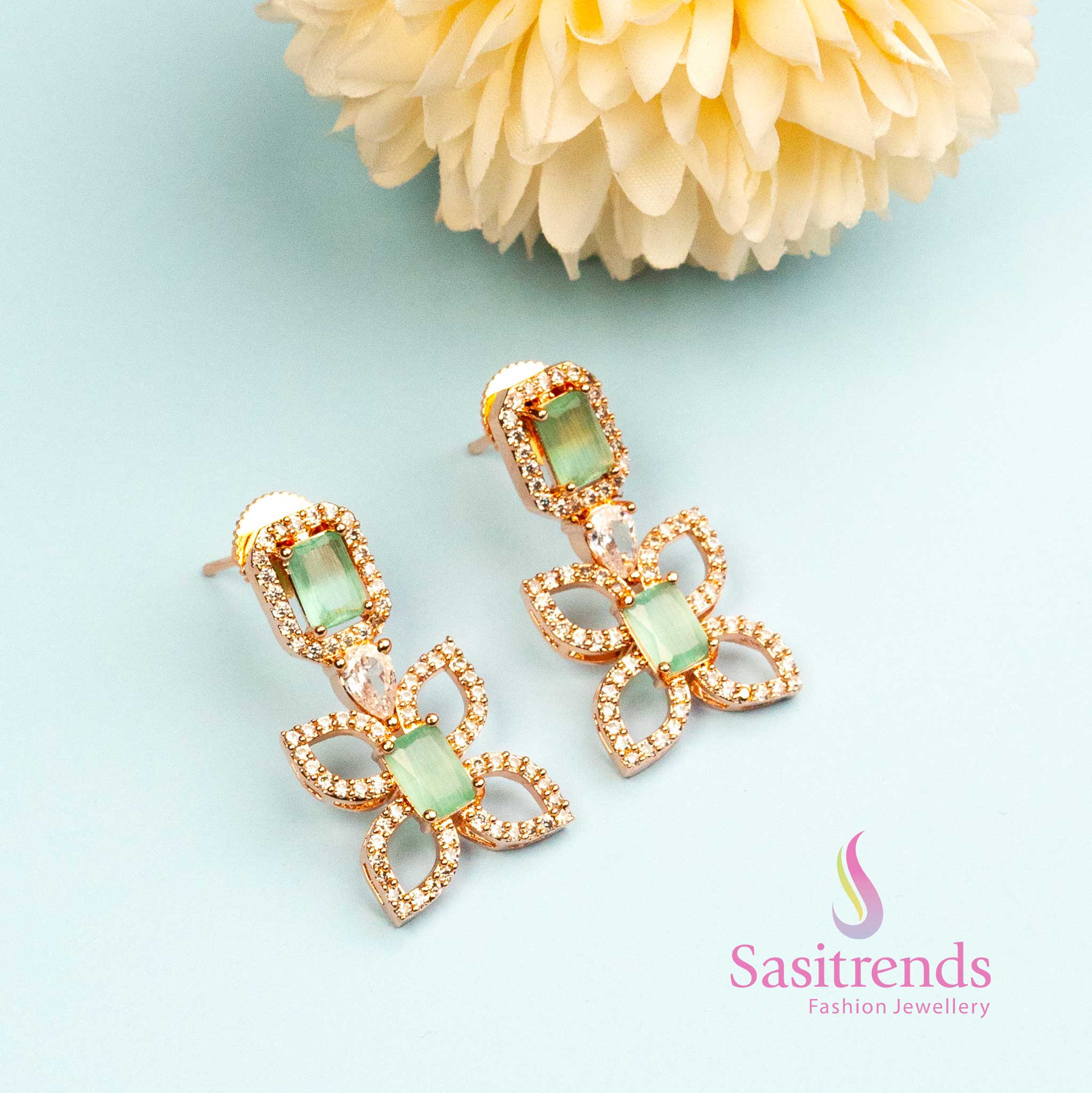 Pastel Wings Delight earrings in butterfly style with greenish mint stones and rose gold – a stylish accessory for chic looks – Sasitrends