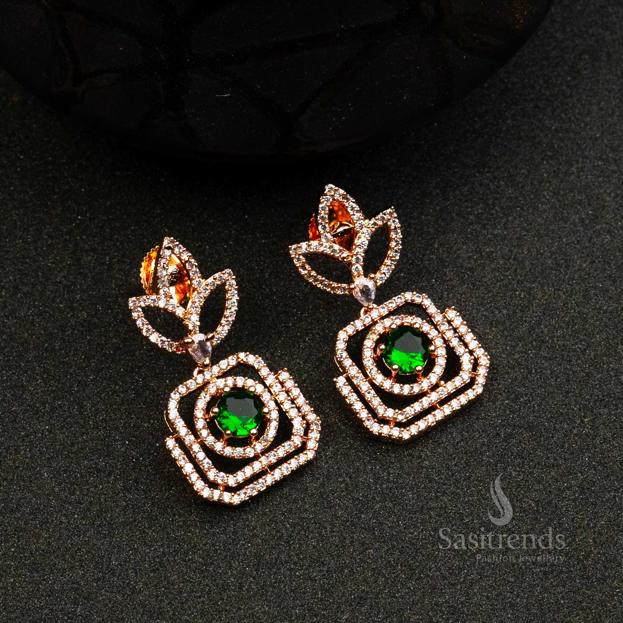 Emerald Empress Glint rose gold earrings with green AD stones – bold ethnic partywear jewellery style – Sasitrends