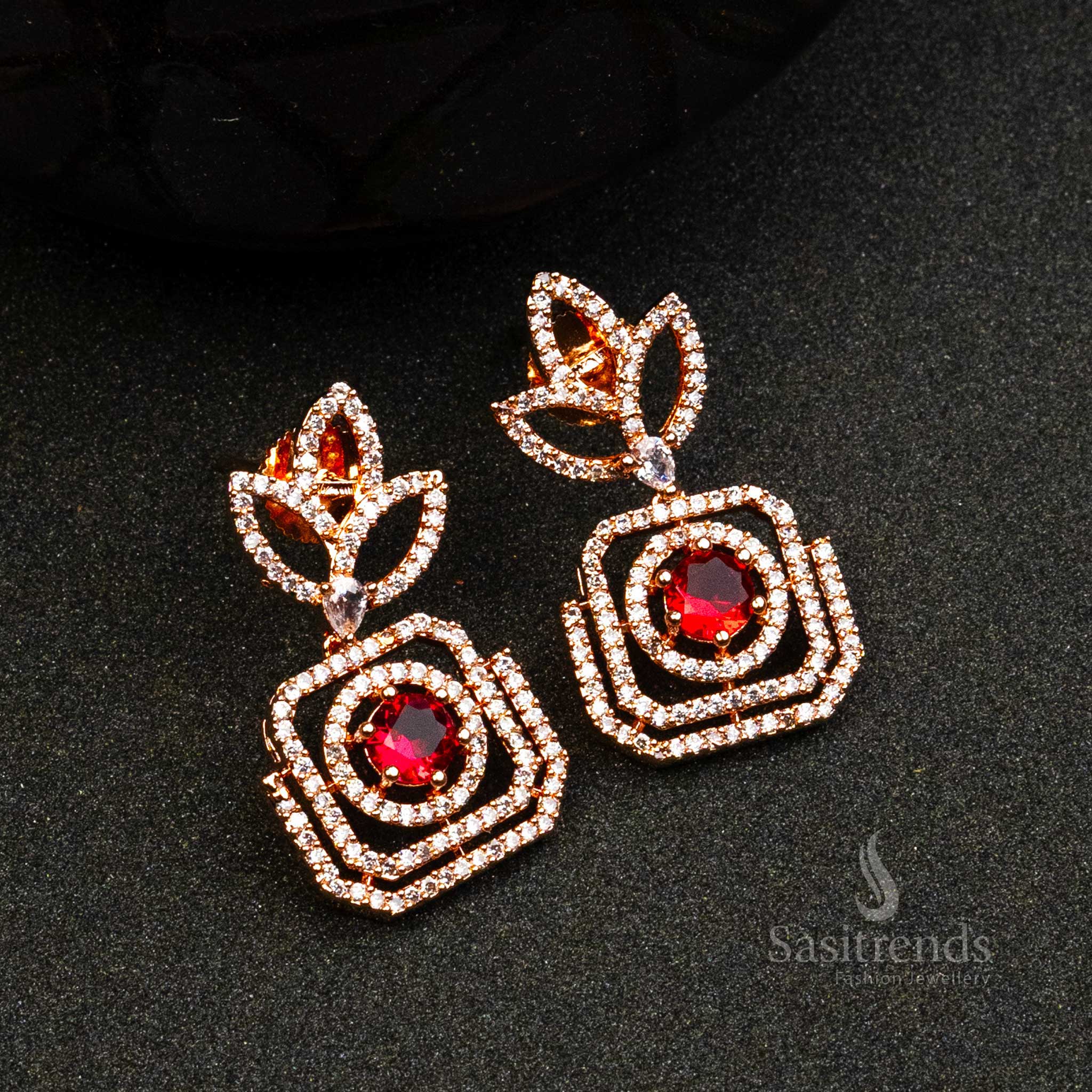 Red Regal Shine earrings in rose gold with red AD stones – modern festive jewellery for traditional wear – Sasitrends
