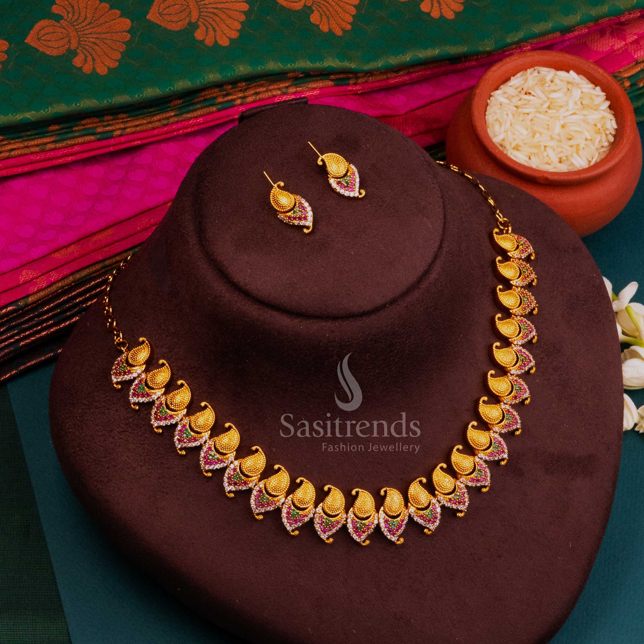 Vibrant temple jewellery with multicolour AD crystals, golden matte lustre and traditional heritage opulence — perfect for auspicious occasions by Sasitrends