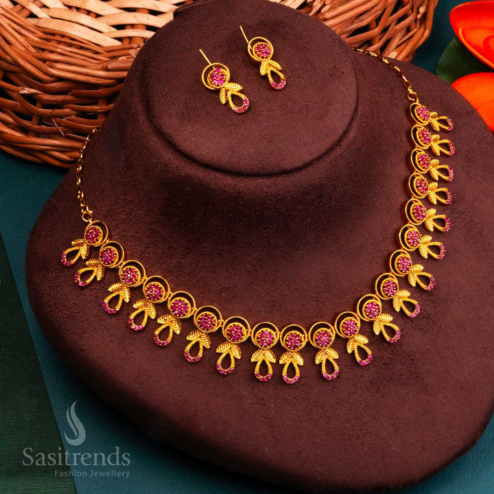 Temple-glam ruby floral jewellery set with shimmering AD crystal glow, inspired by South Indian tradition and enriched with heritage purity by Sasitrends