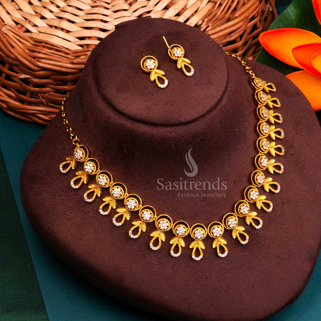 White AD floral temple jewellery with matte gold plating and heritage petal patterns, offering a ceremonial shimmer and sacred traditional style for festive occasions by Sasitrends