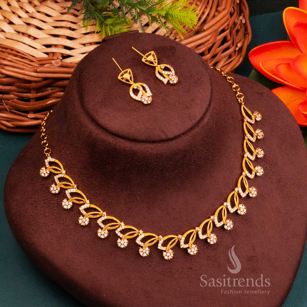 Graceful Temple Matte Gold Plated Jewellery Set With White Stones And Leaf Inspired Elegance – Designed With Devotional Charm And Pure White Radiance – Sasitrends