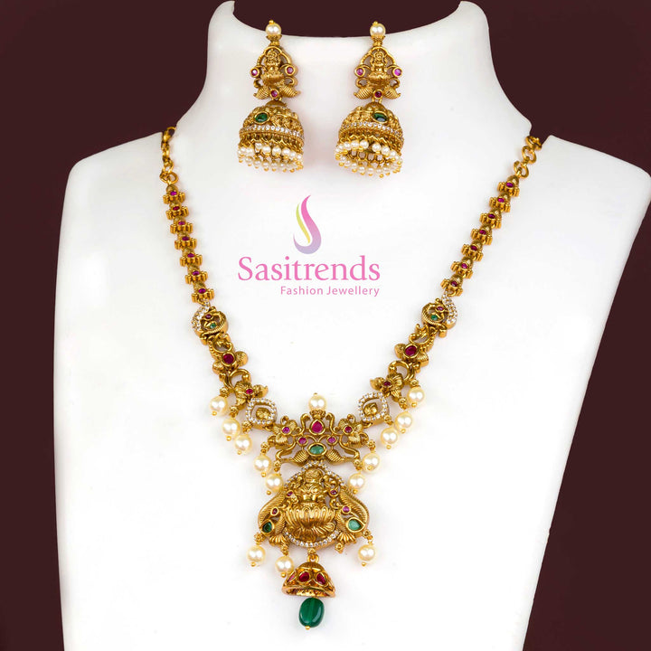 Vibrant Multi Stone Temple Matte Gold Plated Lakshmi Jewellery Set With Colourful AD Stones, Designer Pendant And Traditional Earrings – Celebration Perfect Look – Sasitrends