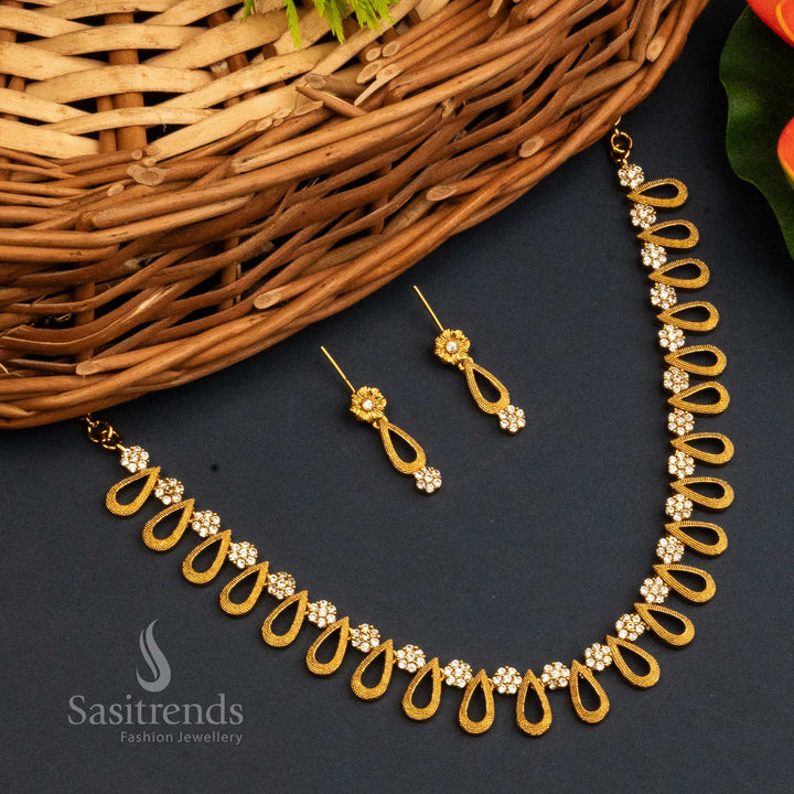 Radiant White Stone Matte Gold Temple Jewellery Set With Sparkling American Diamonds And Finely Crafted Earrings – Traditional Yet Contemporary – Sasitrends