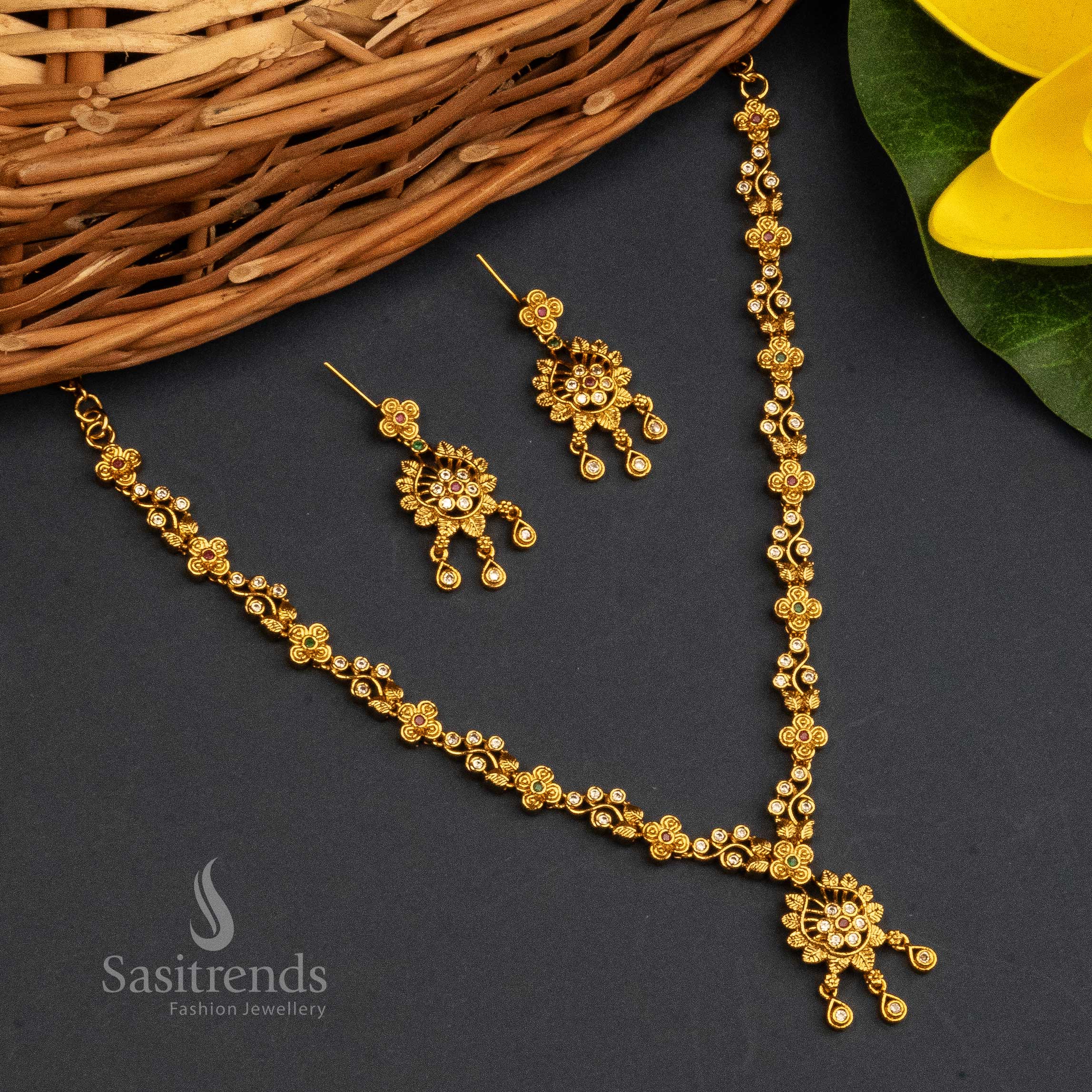 Multi Colour Temple Jewellery Set With Matte Gold Finish, AD Stone Studded Floral Pendant And Ornate Temple Earrings – Ideal For Ethnic Gatherings – Sasitrends