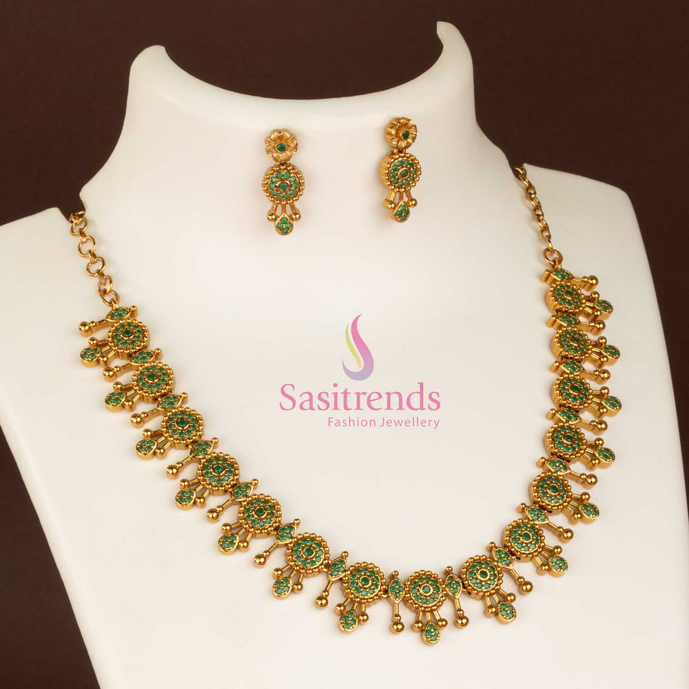 Elegant green temple matte gold plated necklace jewellery set adorned with dazzling AD stones, designed for girls to flaunt traditional beauty during wedding wear - Sasitrends