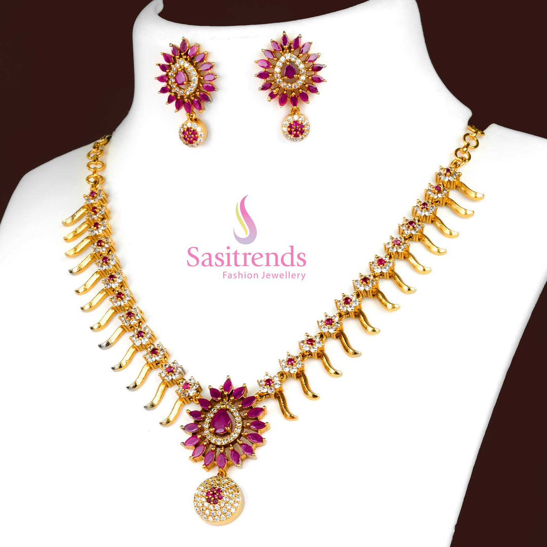 White Ruby Matte Gold Plated Floral Jewellery Set With Classic Central Pendant, Ruby And White AD Stones, And Matching Jhumkas – Ideal For Cultural Functions And Saree Styling – Sasitrends