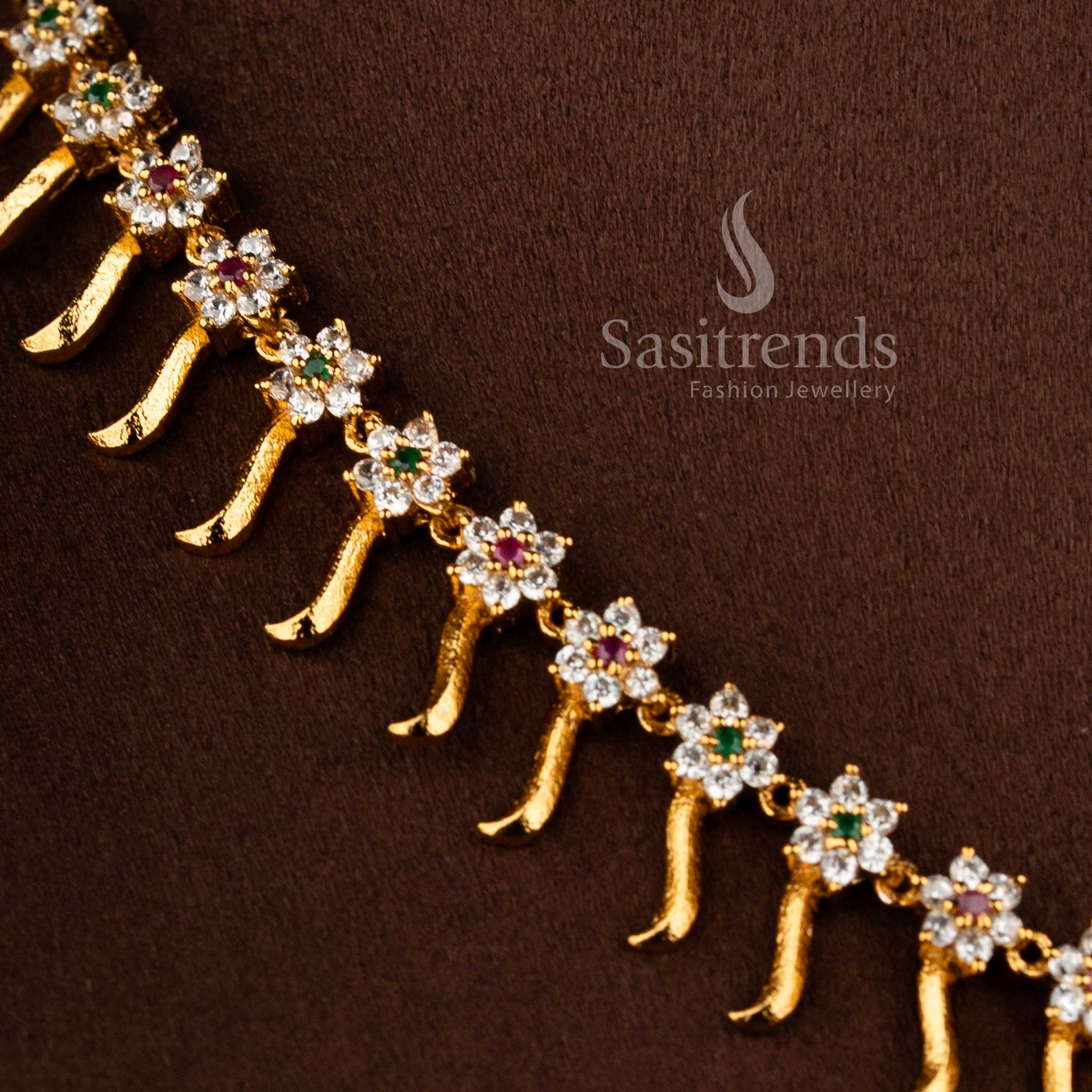 Bridal matte gold floral necklace set with multi color AD stones and intricate design by Sasitrends.